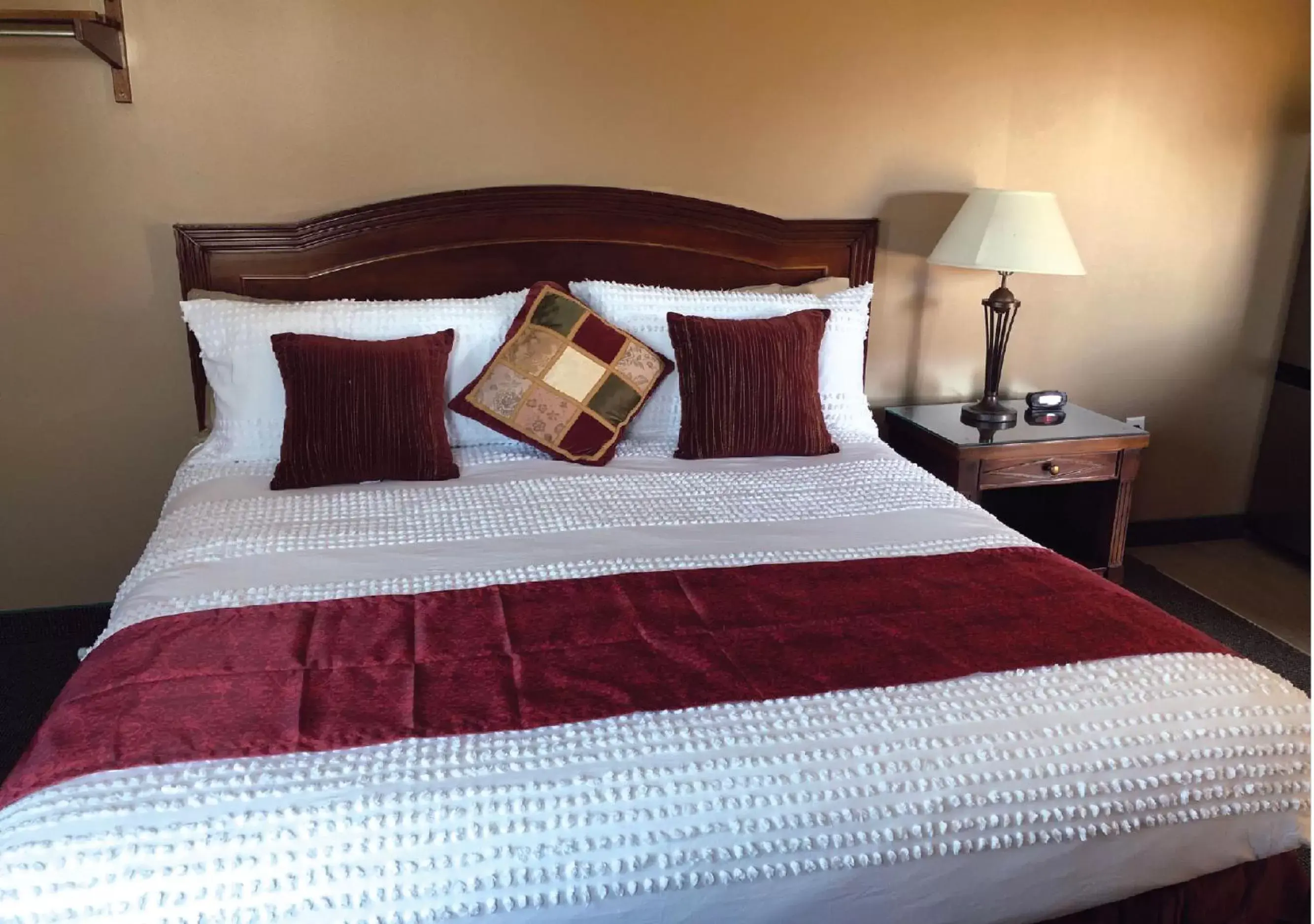 Bed in Brinton Suites