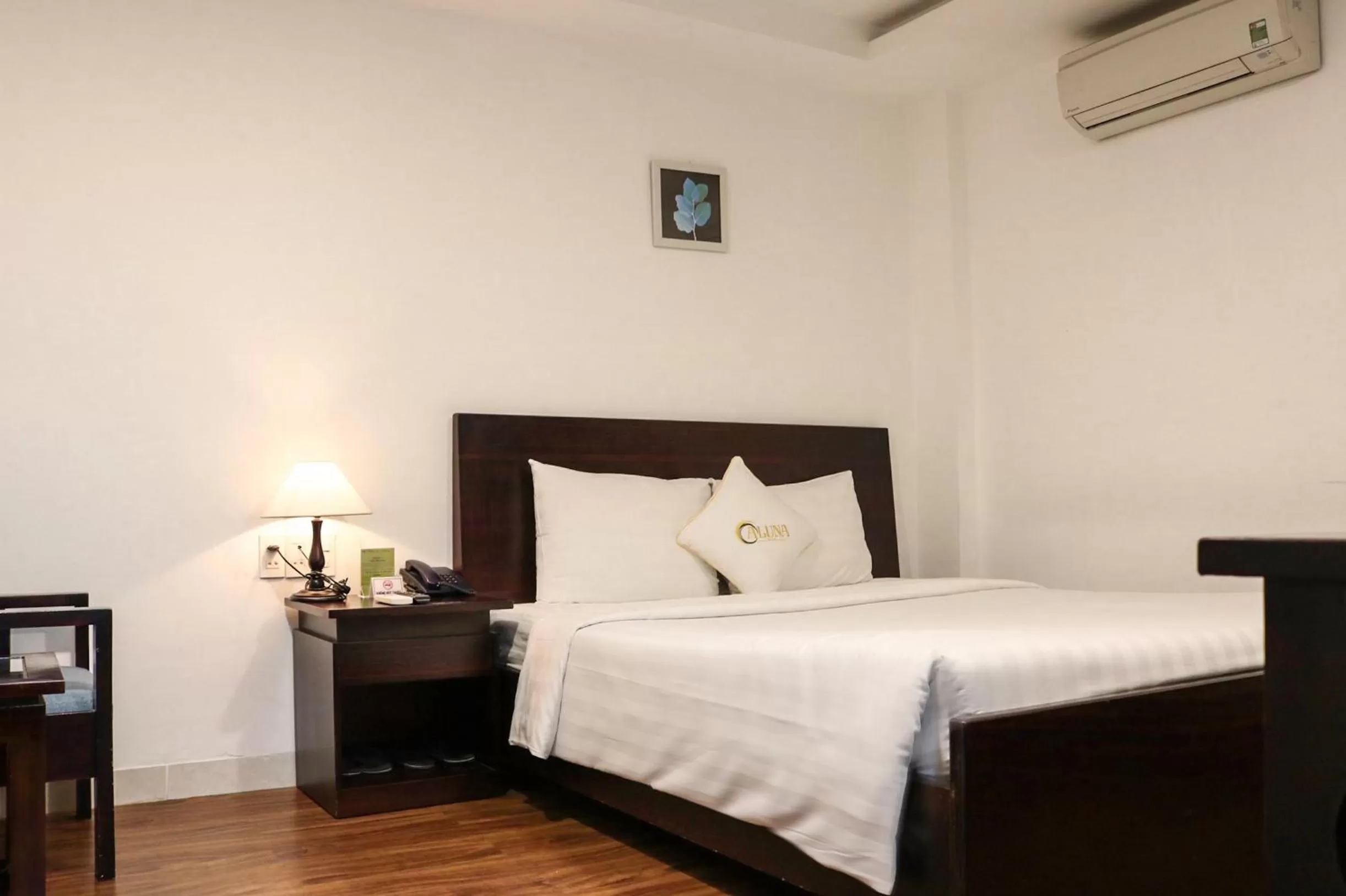 Bed in ALUNA Ben Thanh Hotel