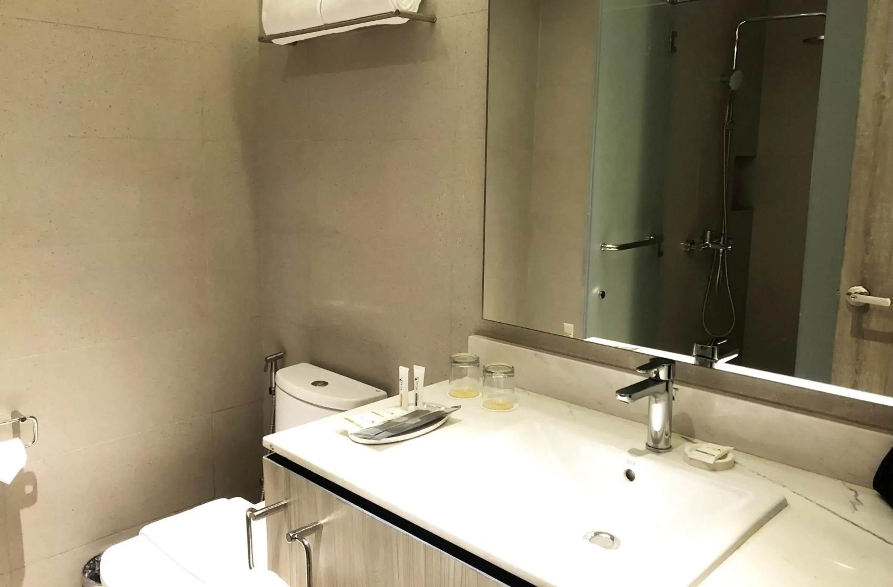 Bathroom in Acacia Hotel Davao -- Multiple Use and Staycation Approved