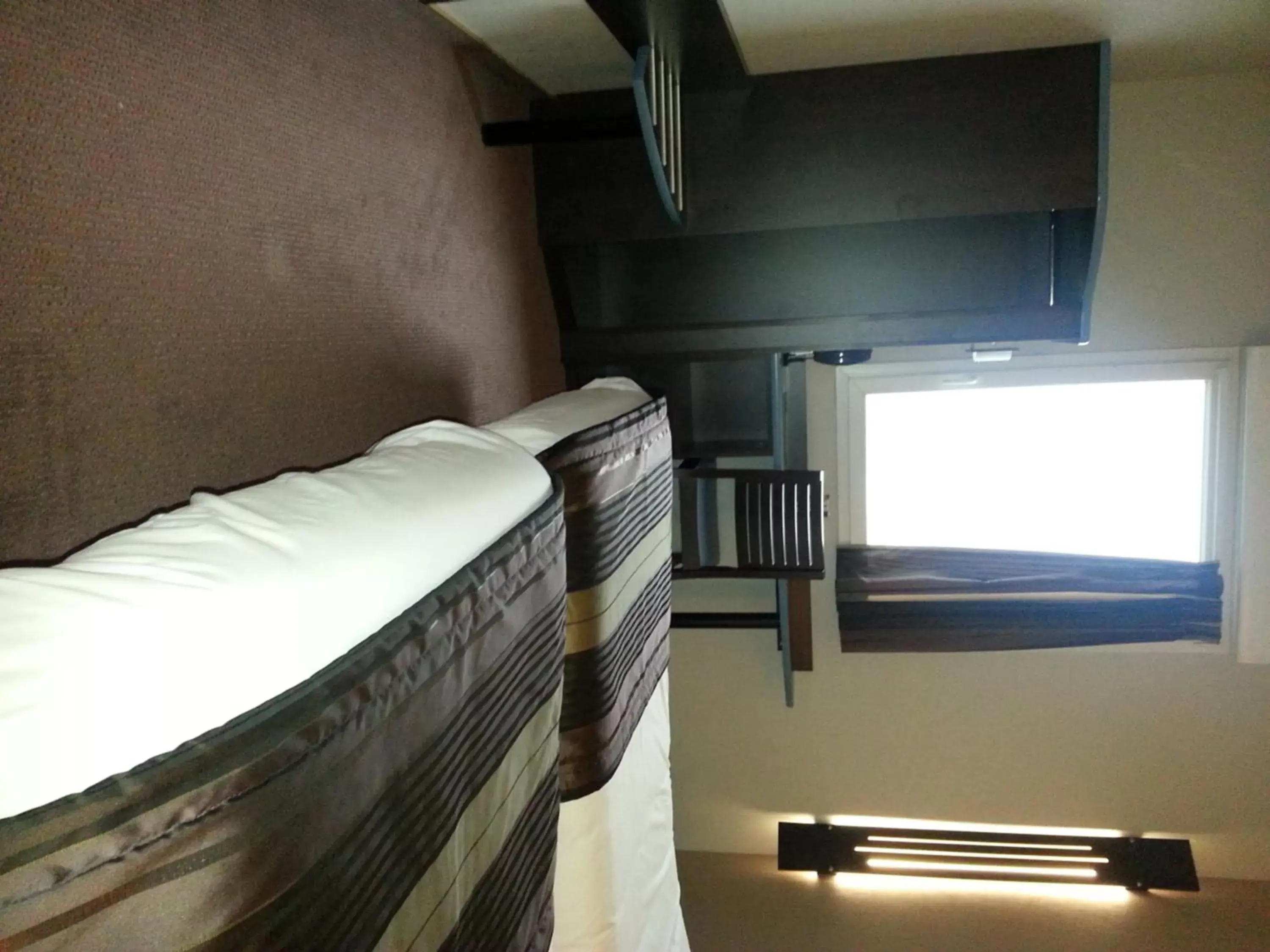 Bed in Hôtel Akena City Caudry