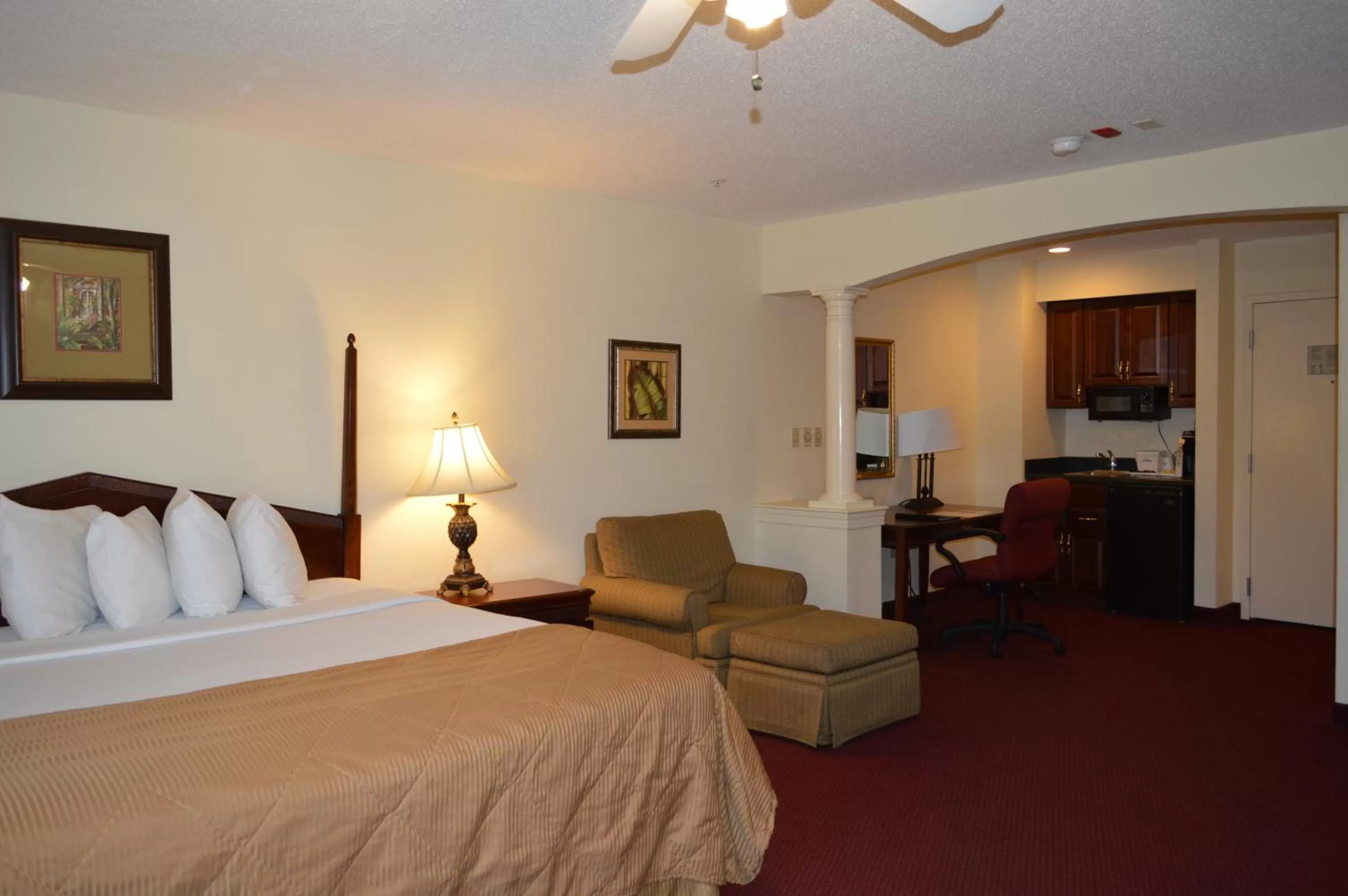 Seating area, Bed in Opal Hotel & Suites