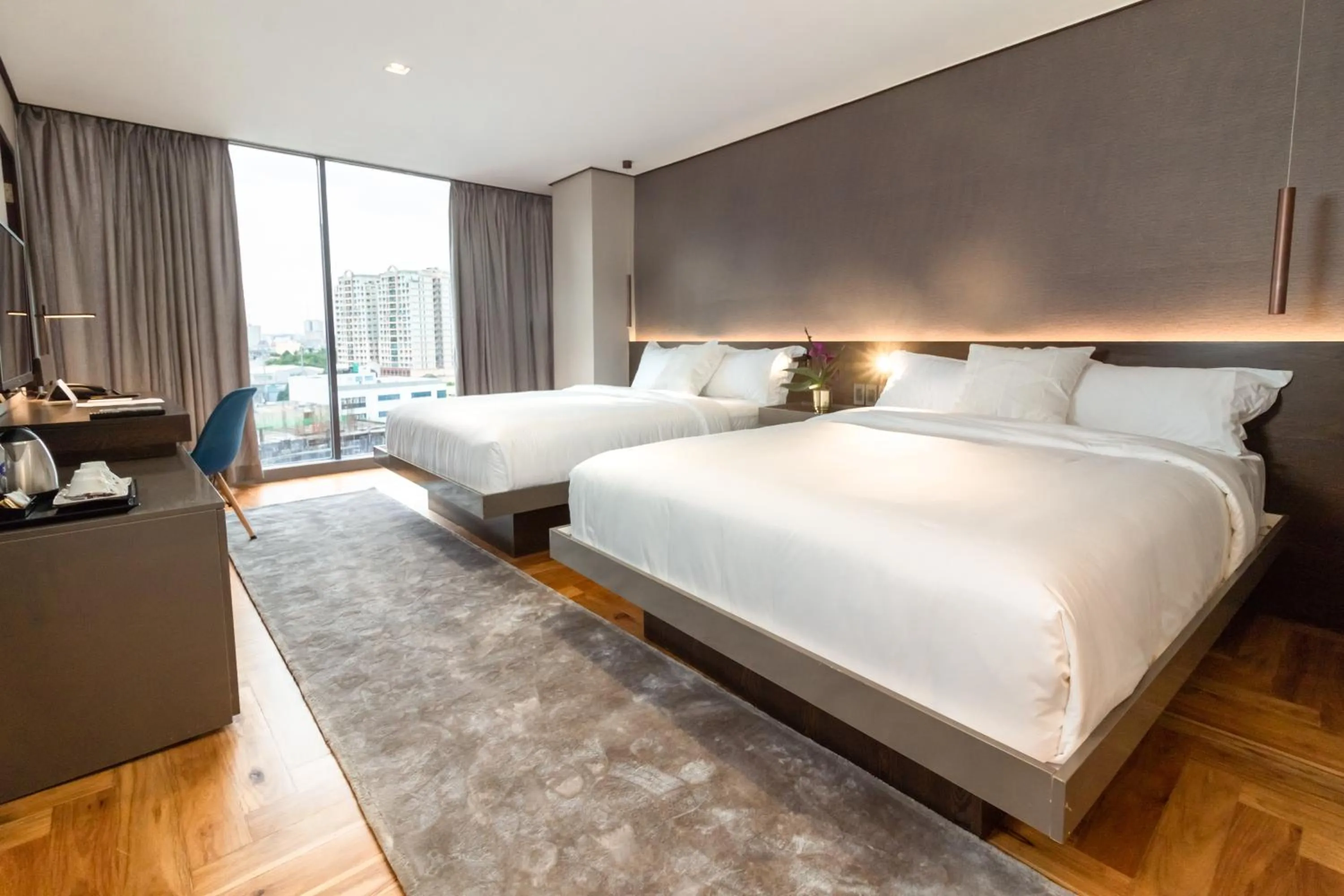 Bed in Ramada Encore by Wyndham Makati