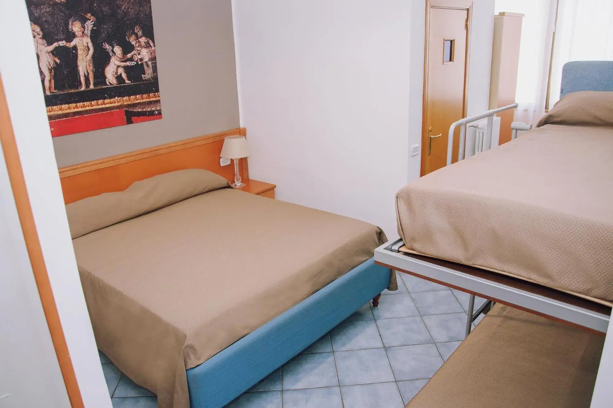 Bed in Hotel Piccolo Sogno