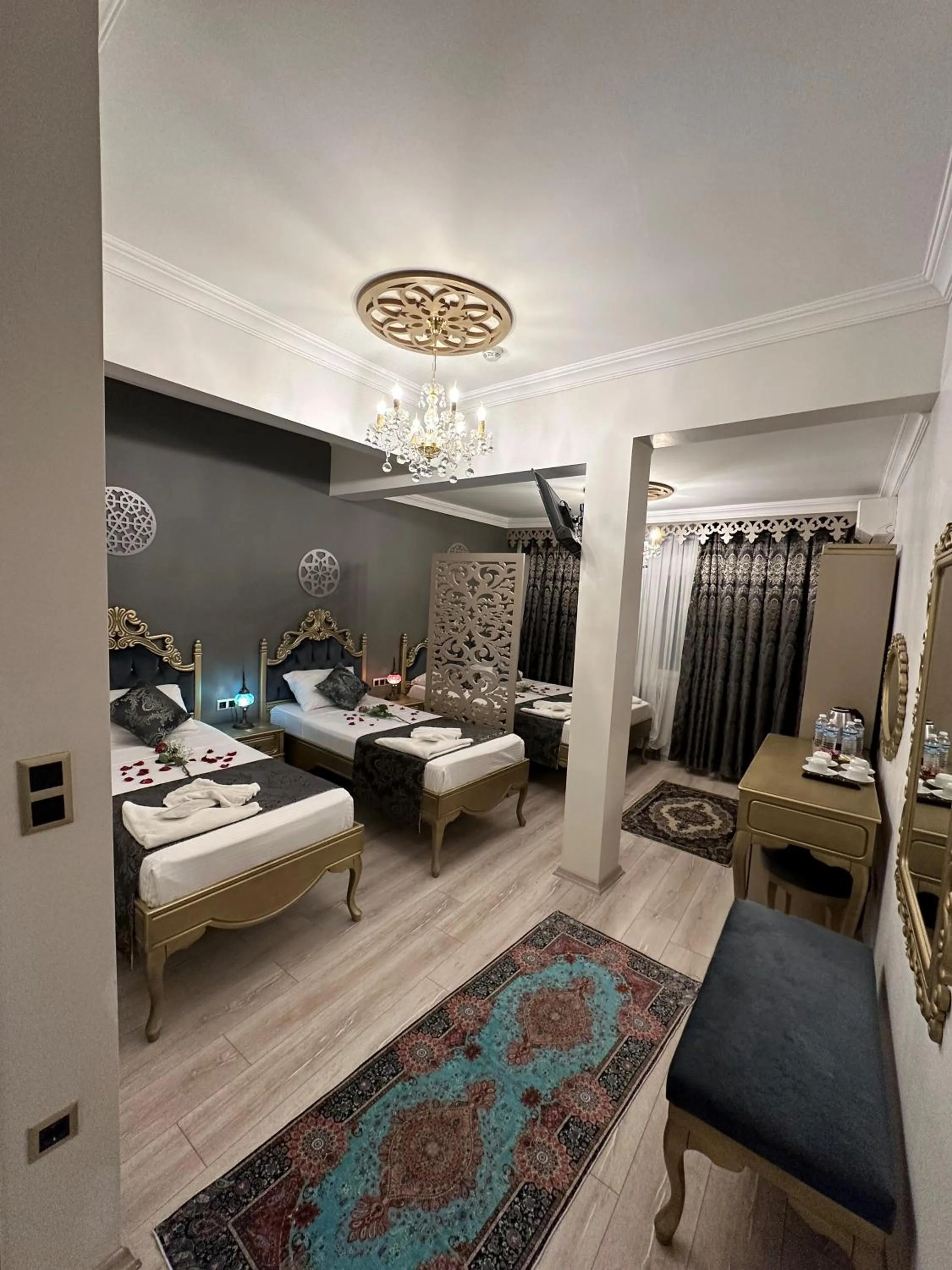 Bed in Ethnica Suites