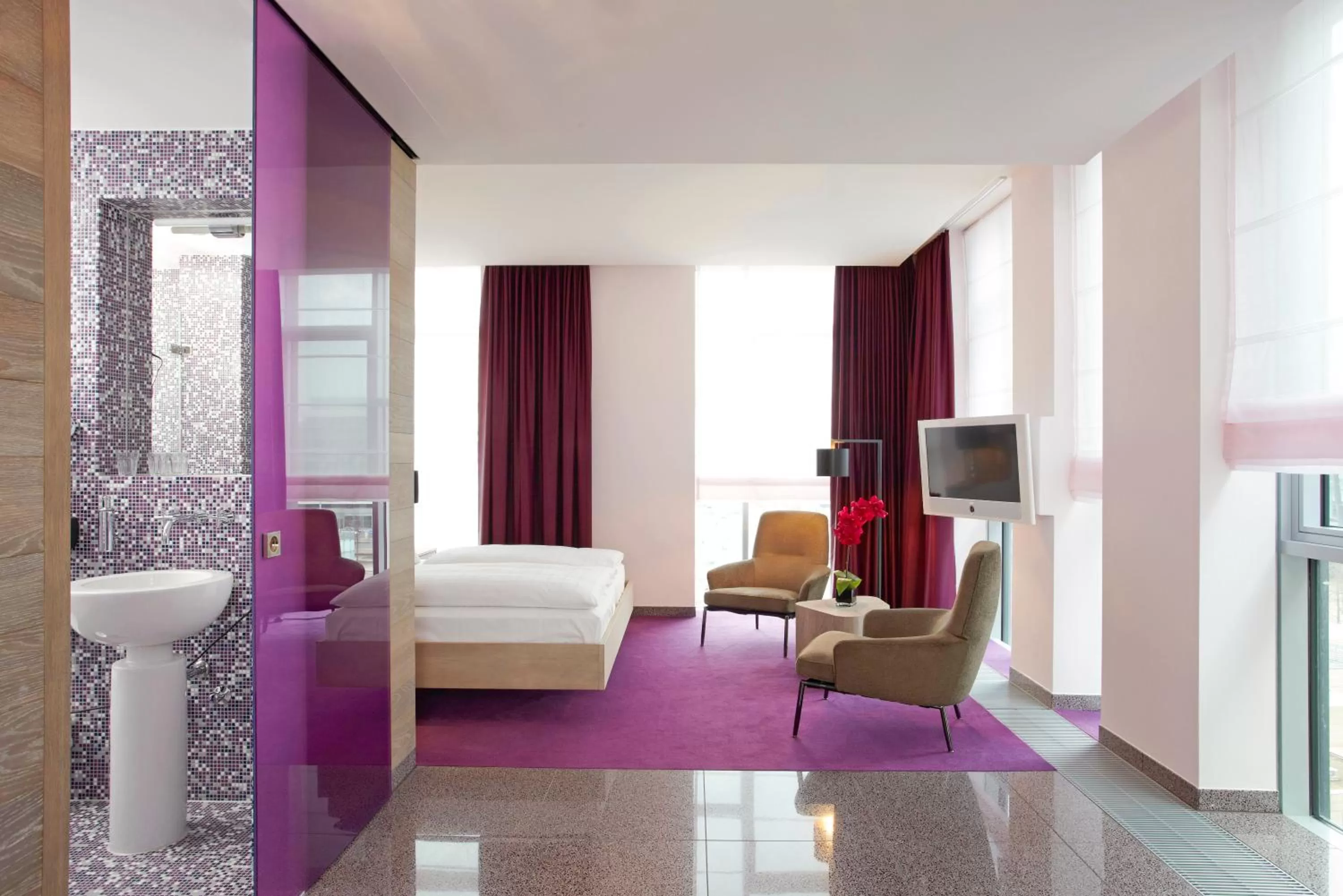 Photo of the whole room, Bed in abito Suites