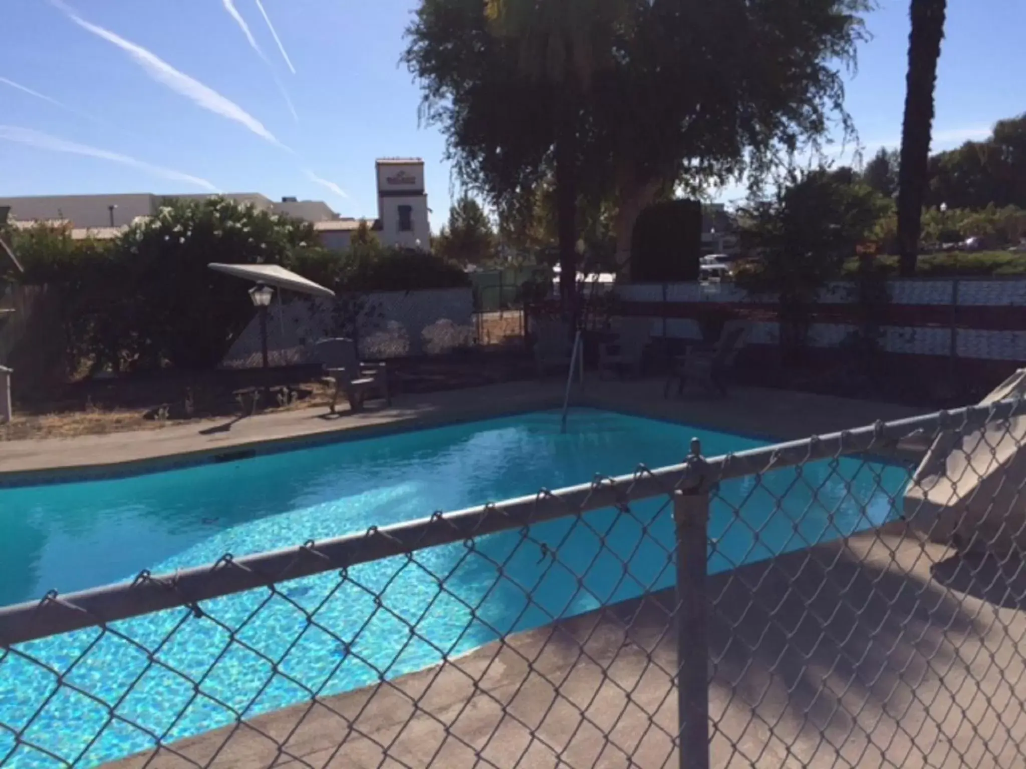 Day, Swimming Pool in Vino Inn & Suites