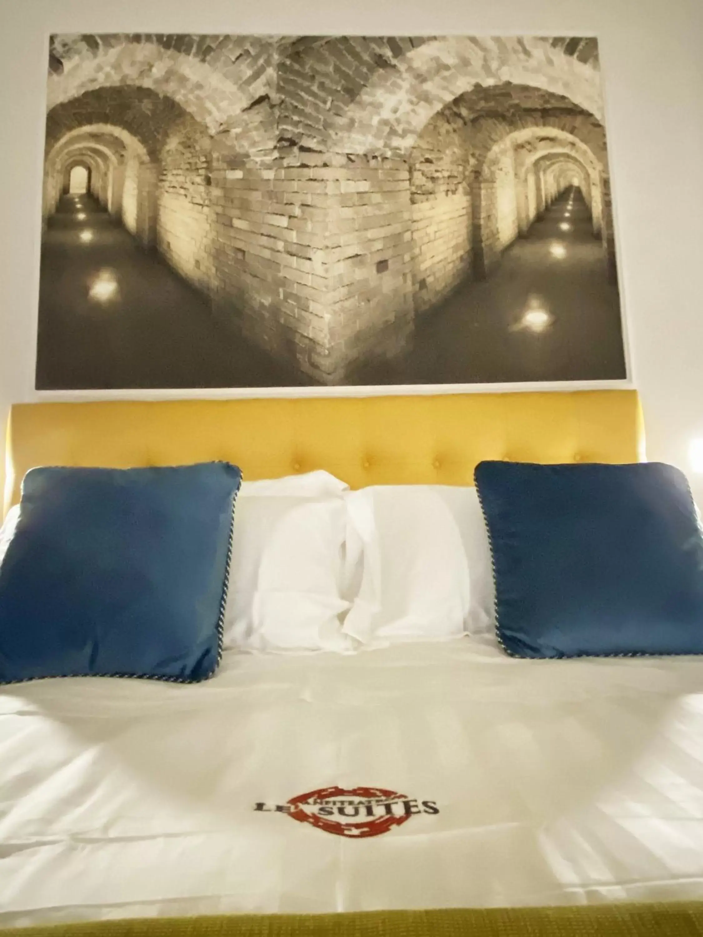 Bed in ANFITEATRO LE SUITES