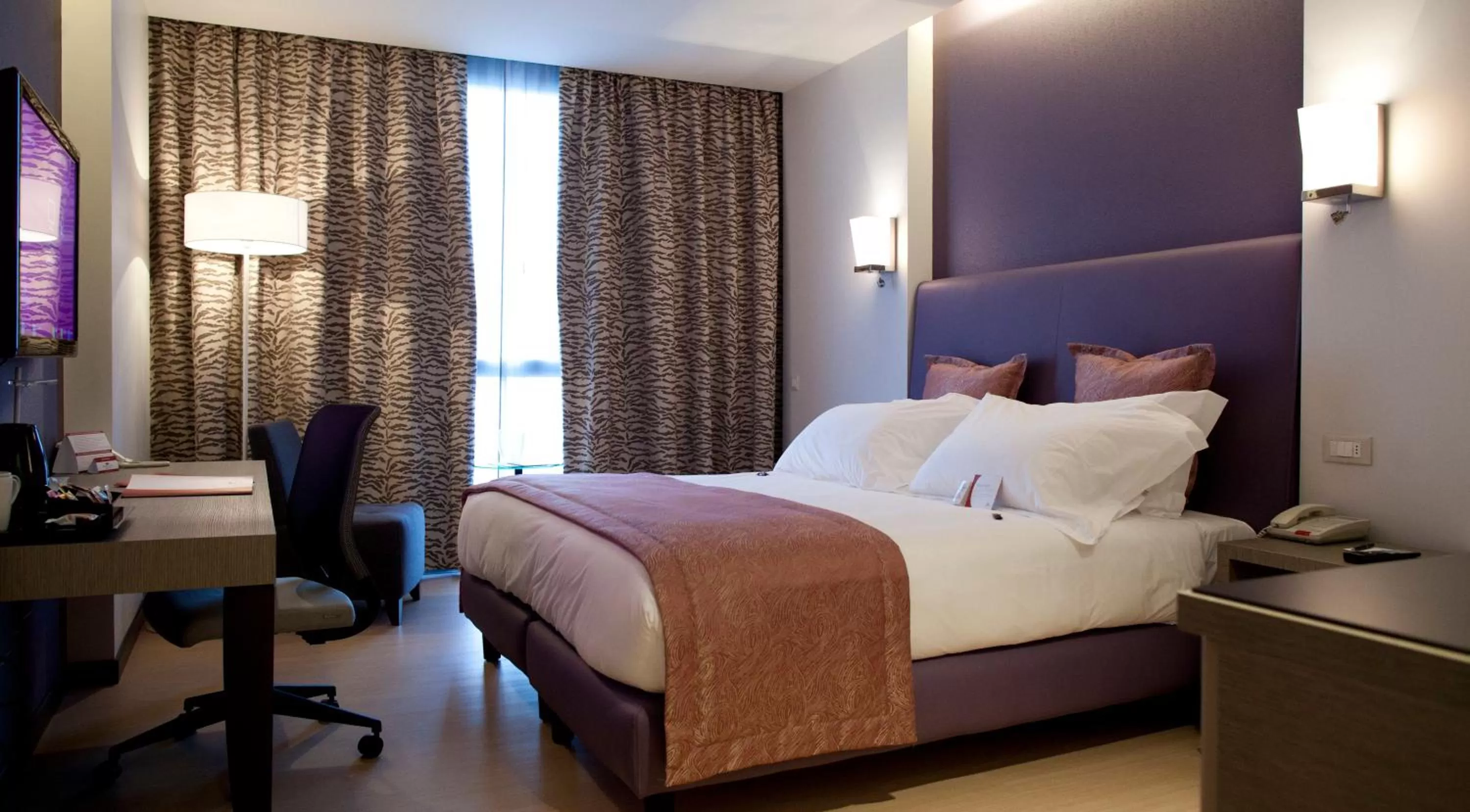 Photo of the whole room, Bed in Crowne Plaza Verona Fiera by IHG