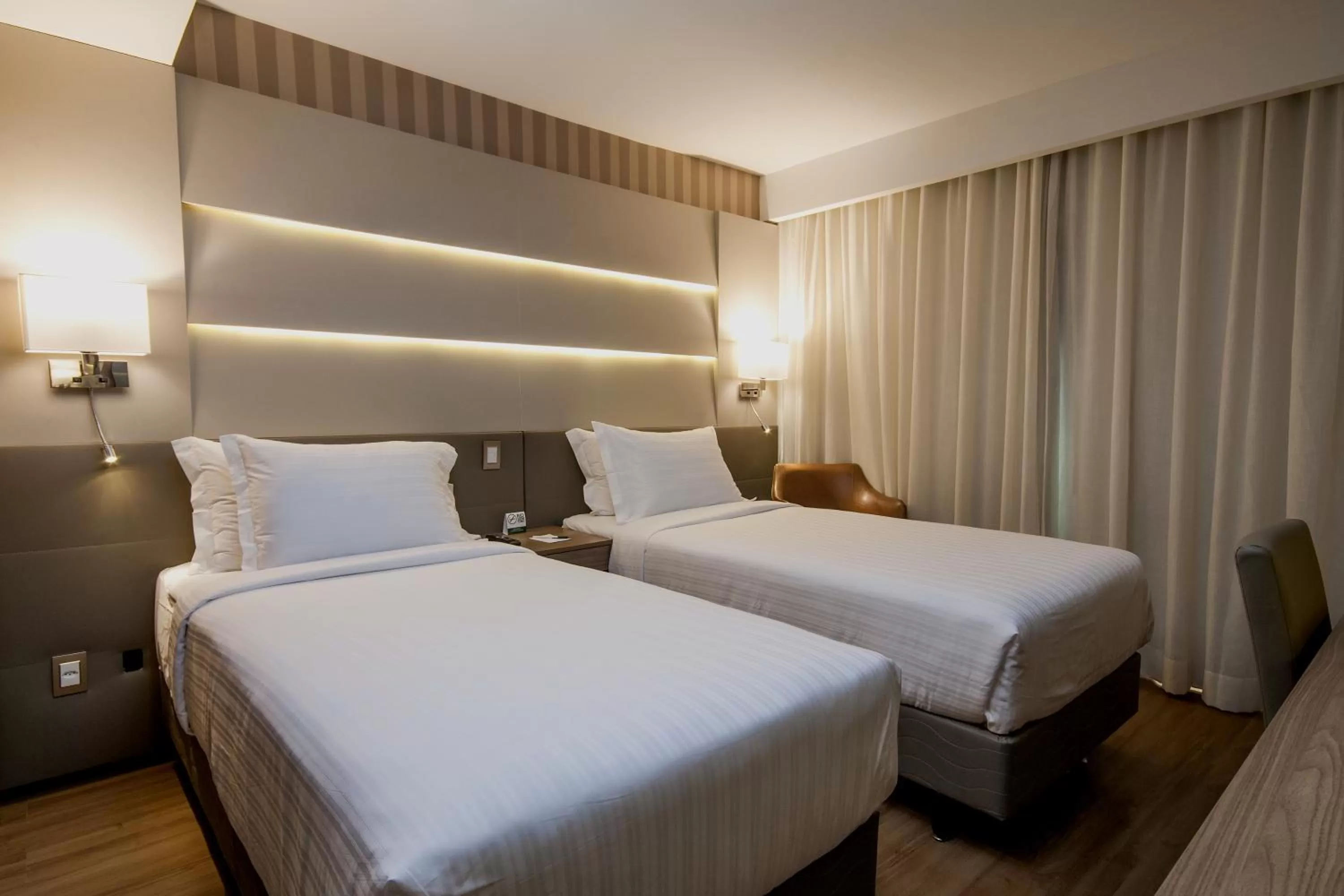 Bed in Américas Copacabana Hotel