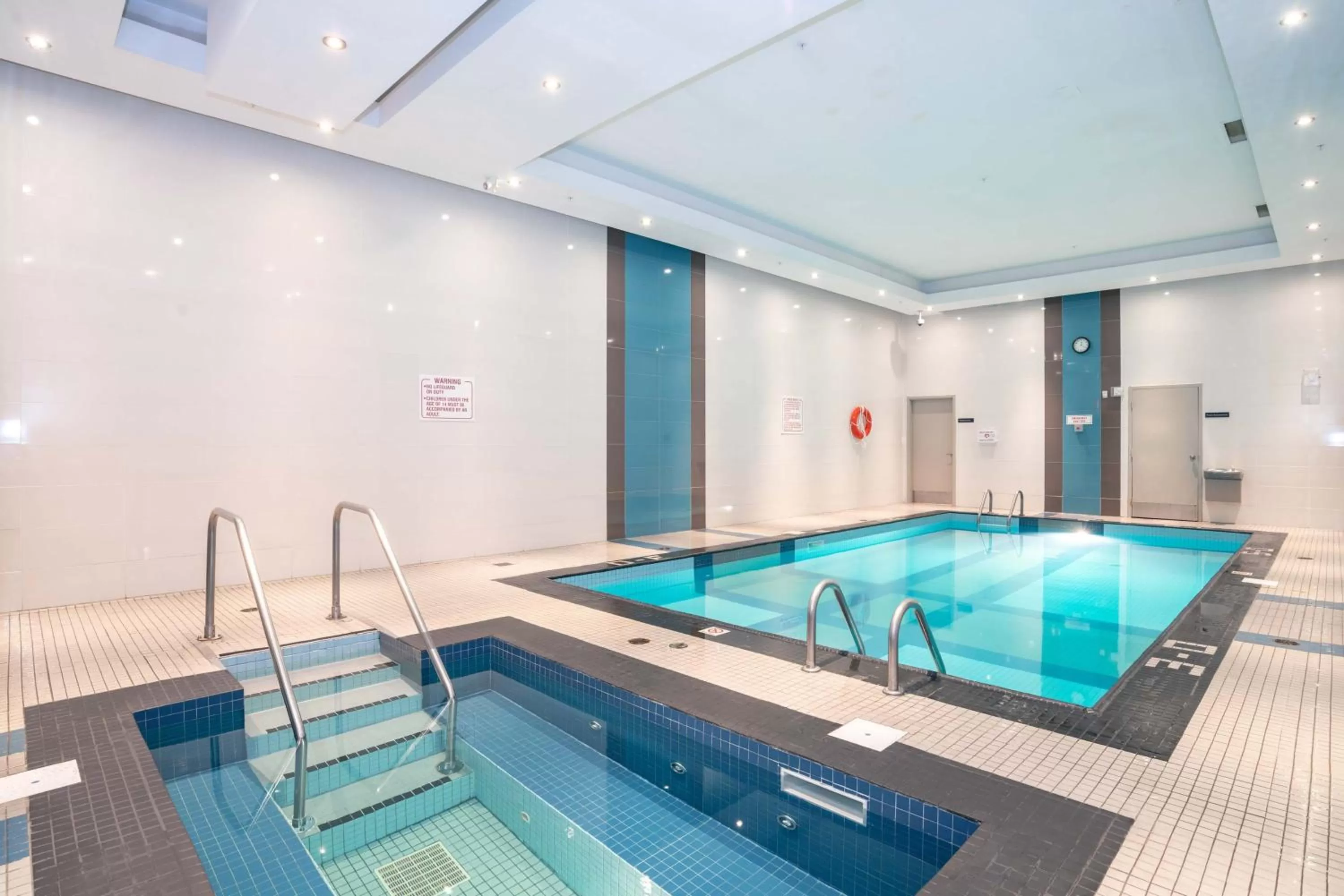 Swimming pool in Sandman Hotel & Suites Winnipeg Airport