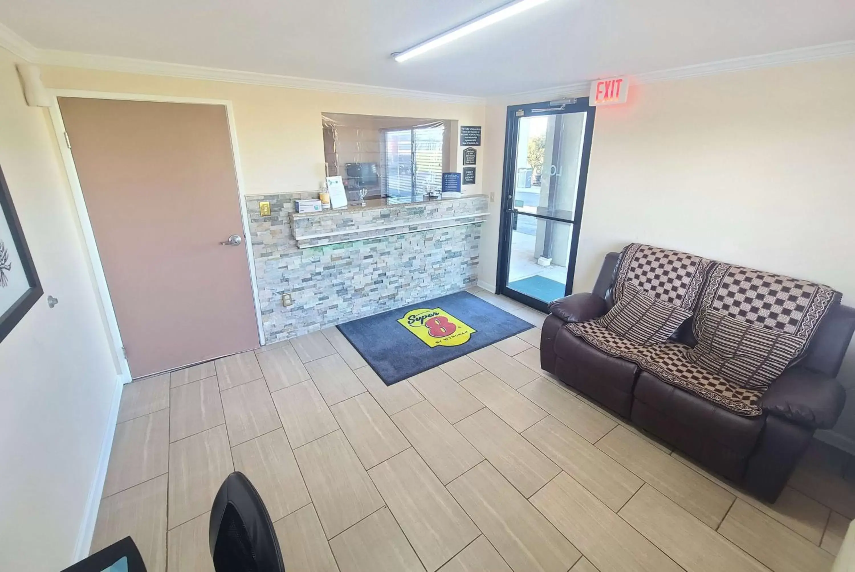 Lobby or reception in Super 8 by Wyndham McGehee Lobby or reception in Super 8 by Wyndham McGehee
