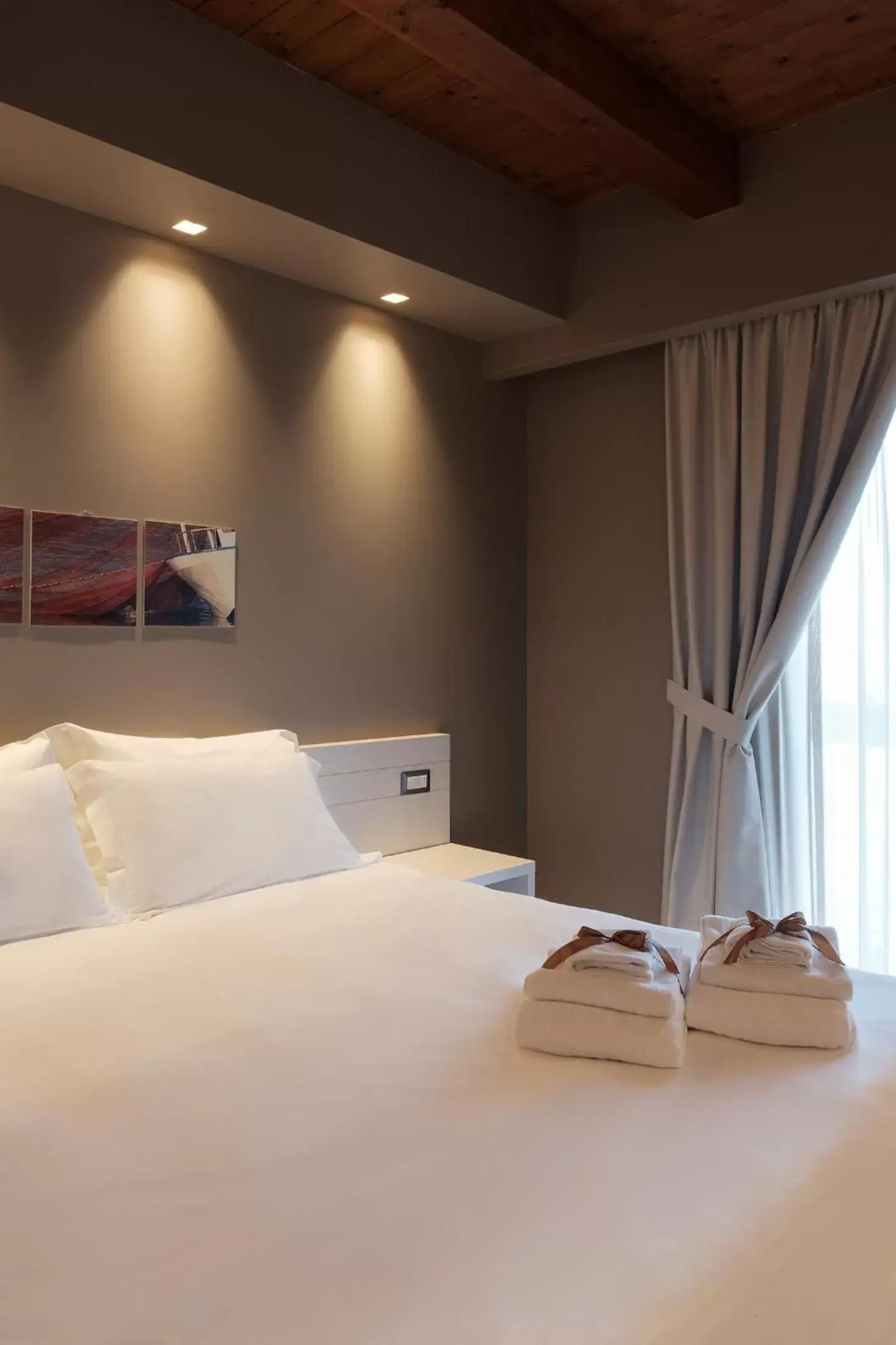 Bed in Il Casato Deluxe Rooms