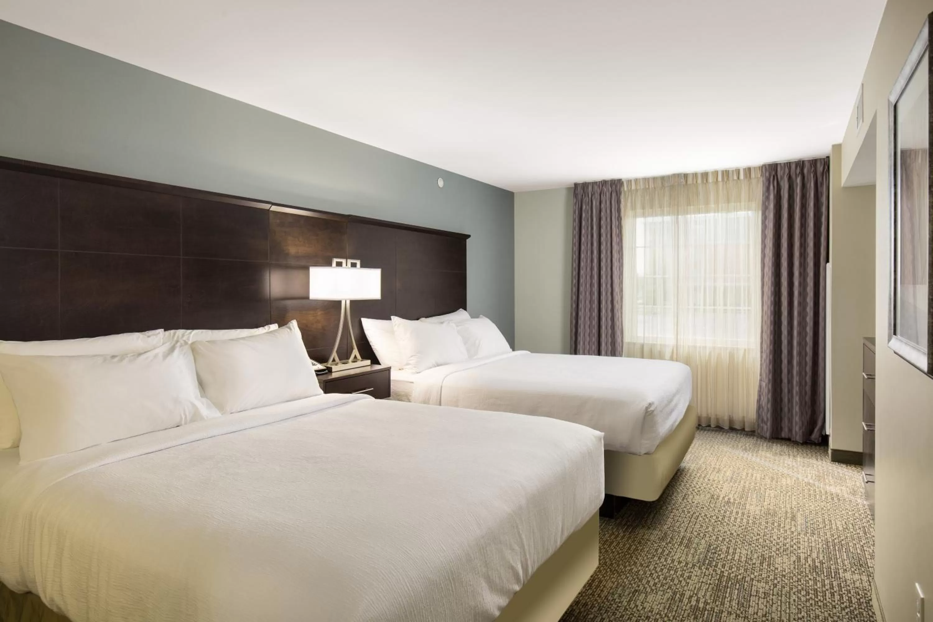 Photo of the whole room, Bed in Staybridge Suites Toledo/Maumee by IHG