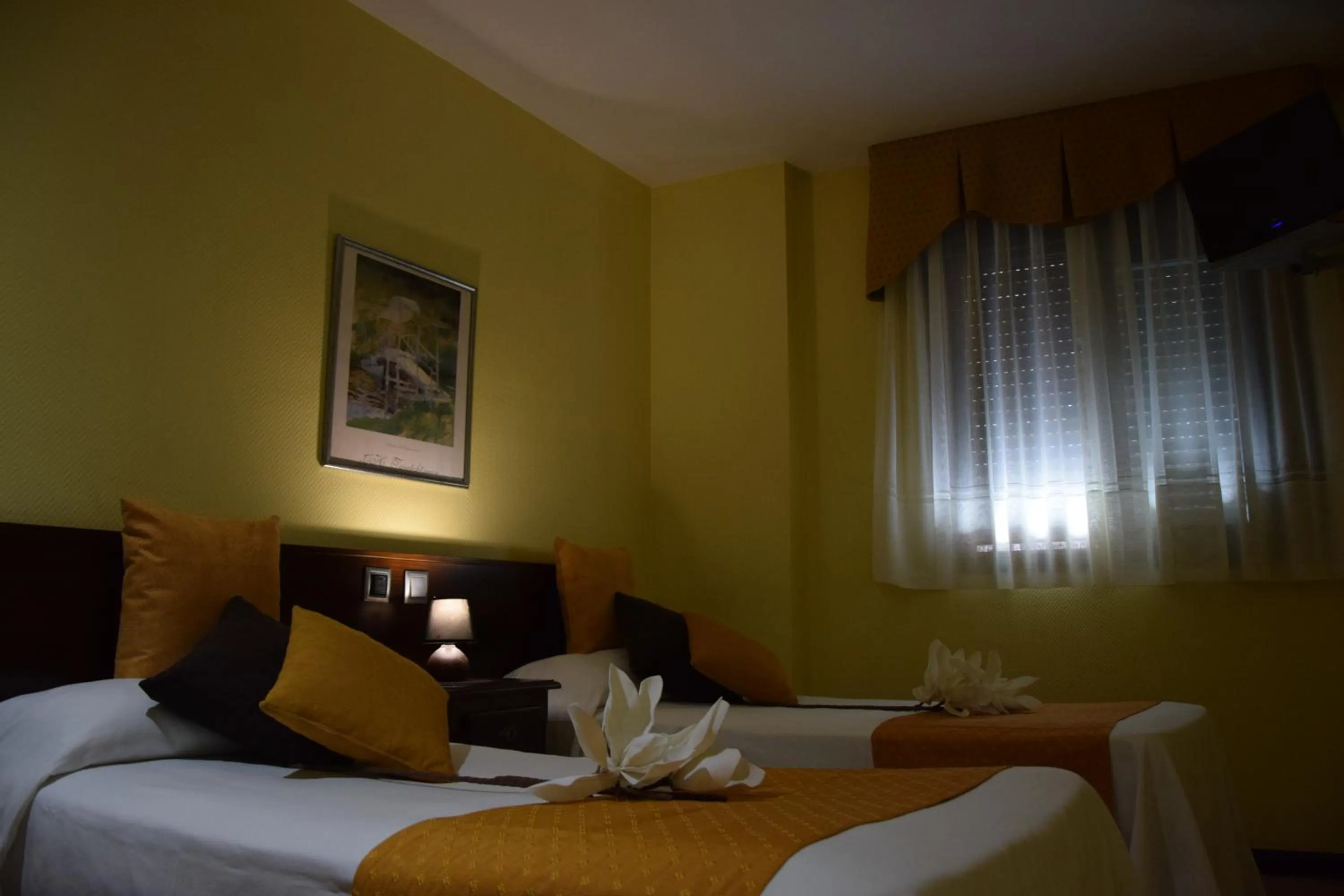 Bed in Hotel Complutense