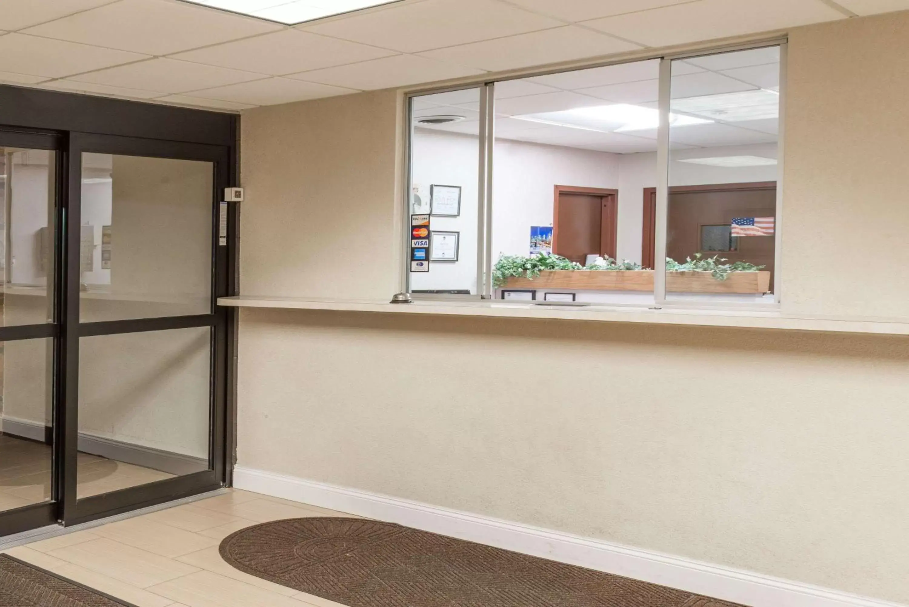 Lobby or reception in Super 8 by Wyndham St Charles Lobby or reception in Super 8 by Wyndham St Charles