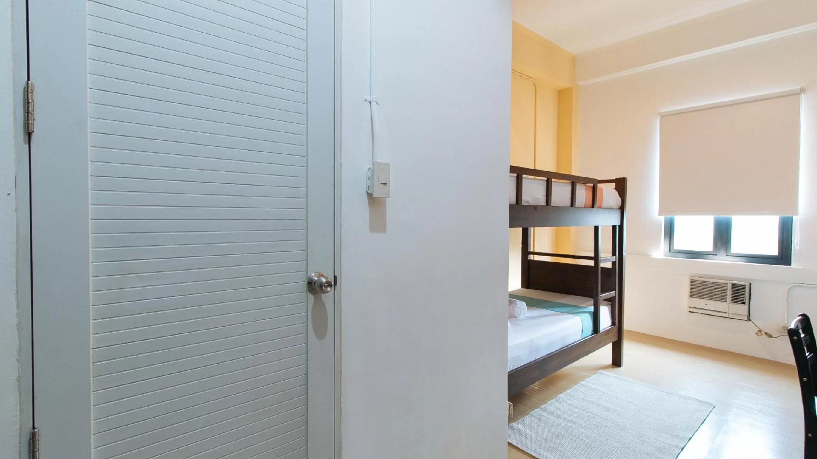 Bedroom in Sans Hotel Laperal Manila