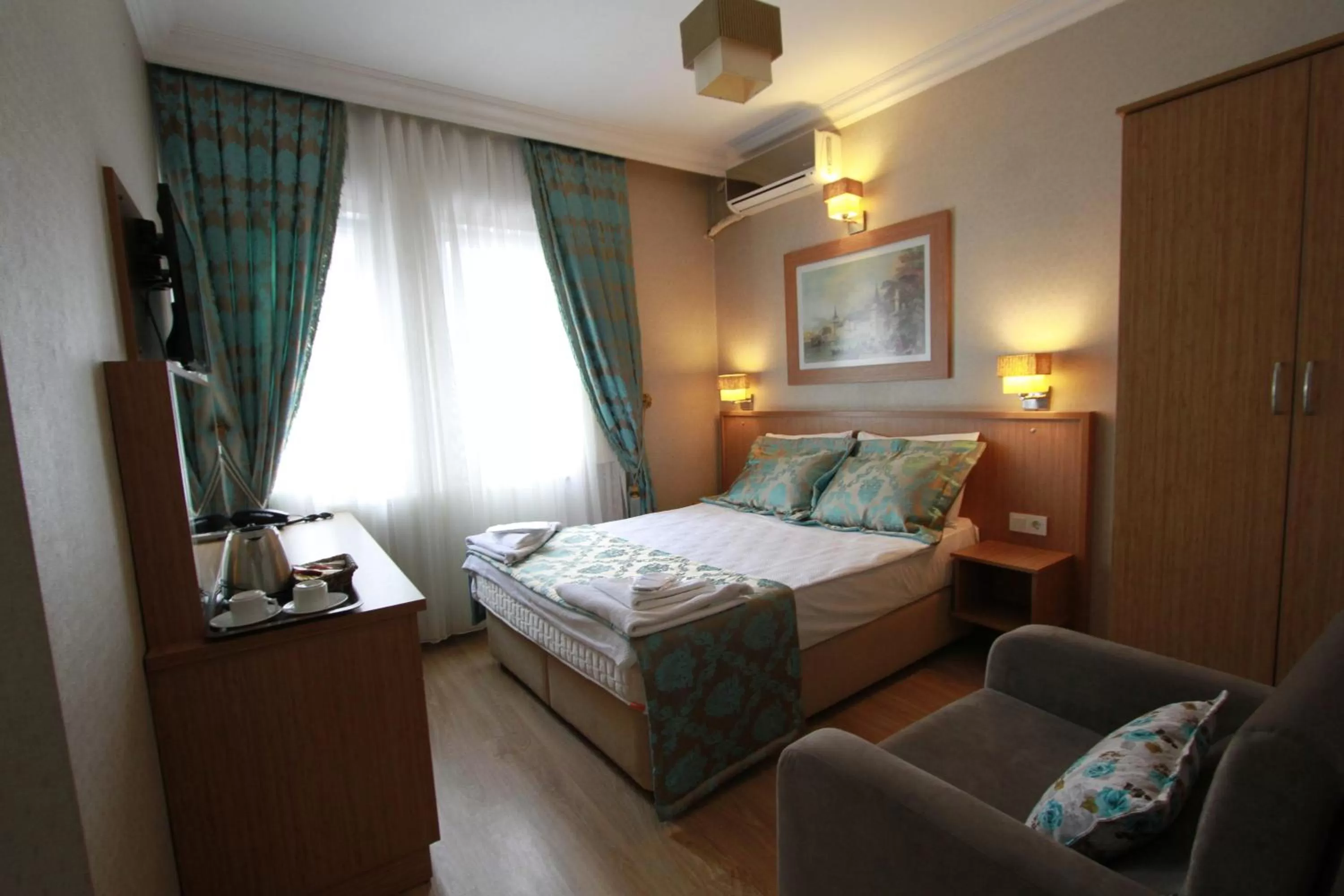 Bed in Agora Boutique Hotel & Bistro