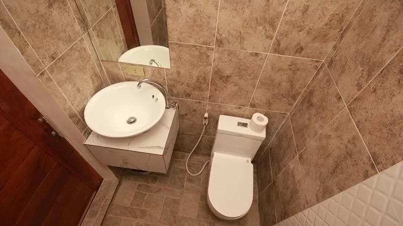 Toilet in El Nido Royal Palm Inn