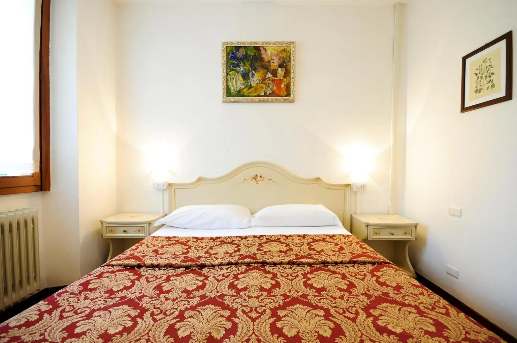 Bed in Hotel Terzo Crotto
