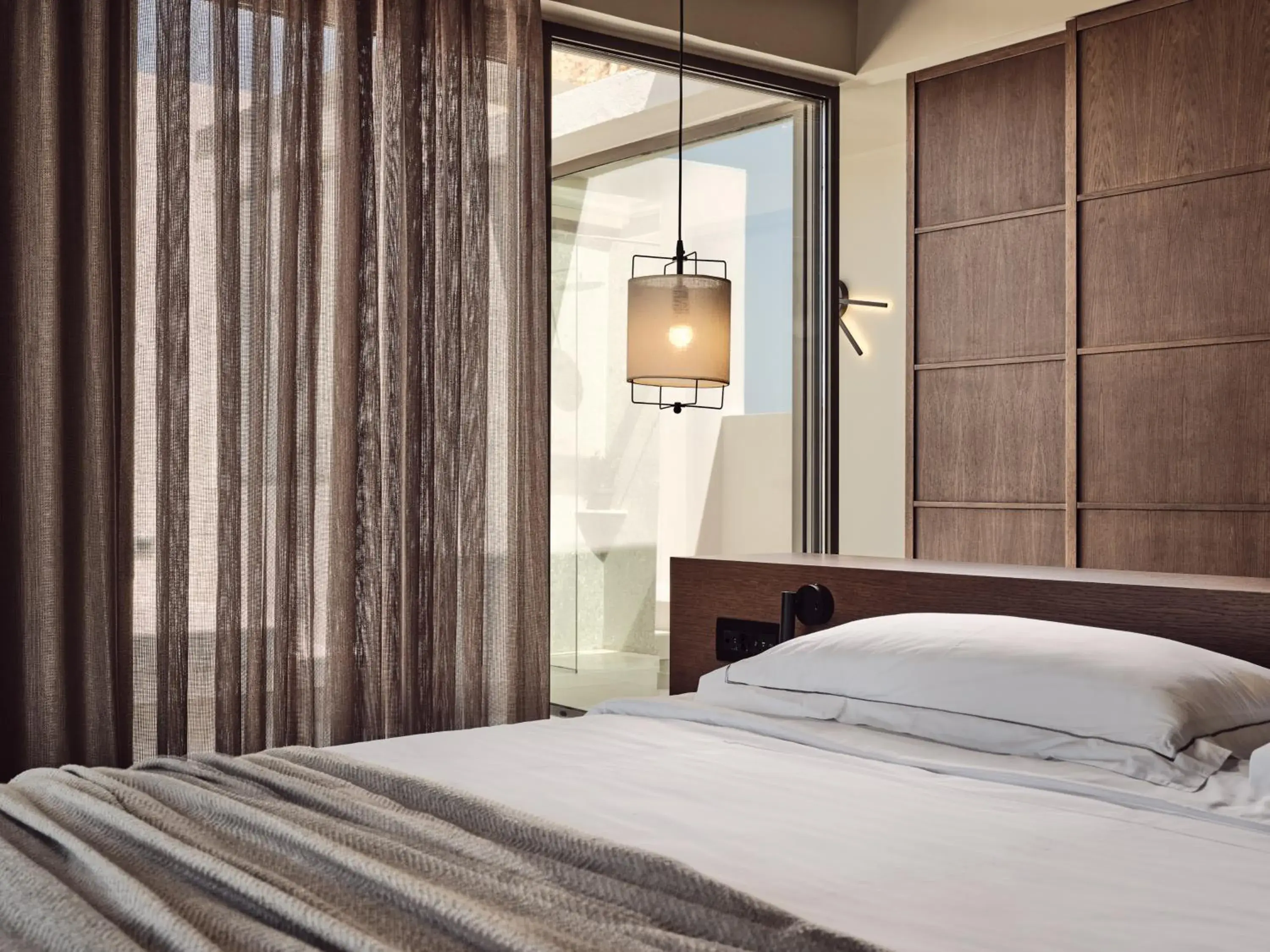 Bed in The Royal Senses Resort Crete, Curio Collection by Hilton
