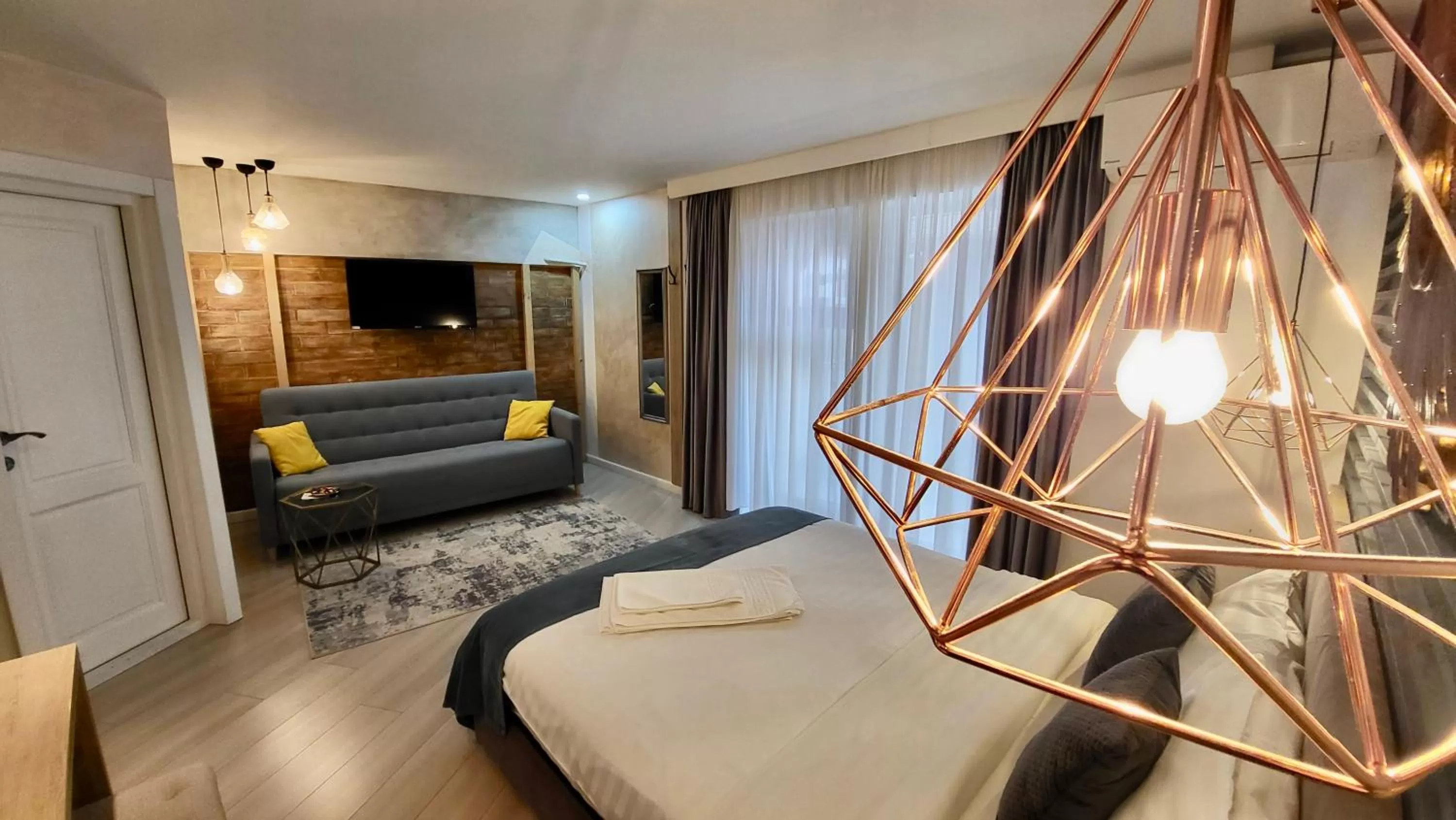 Photo of the whole room, Bed in Lumiere House Sibiu