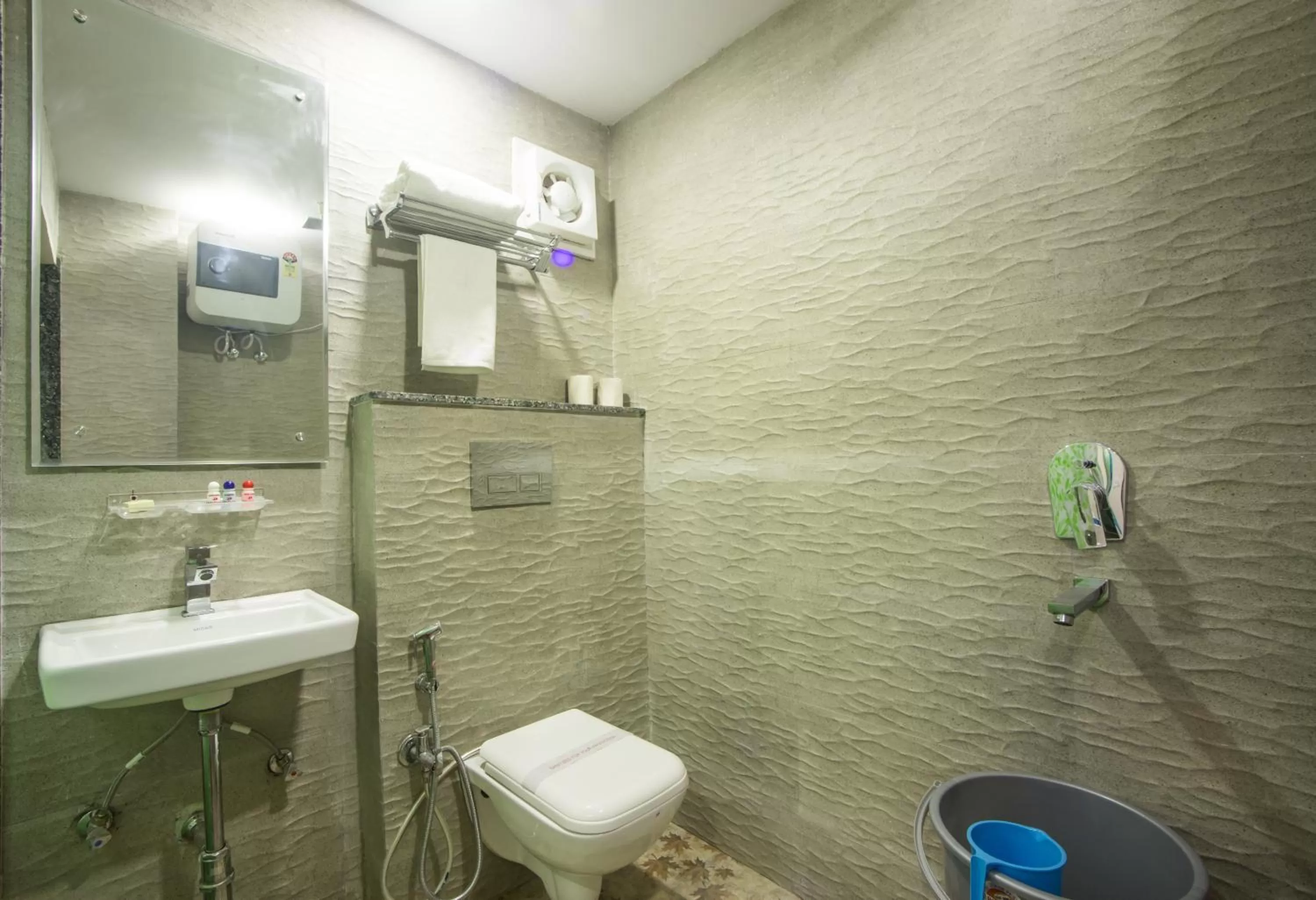 Toilet in Hotel Harsha International