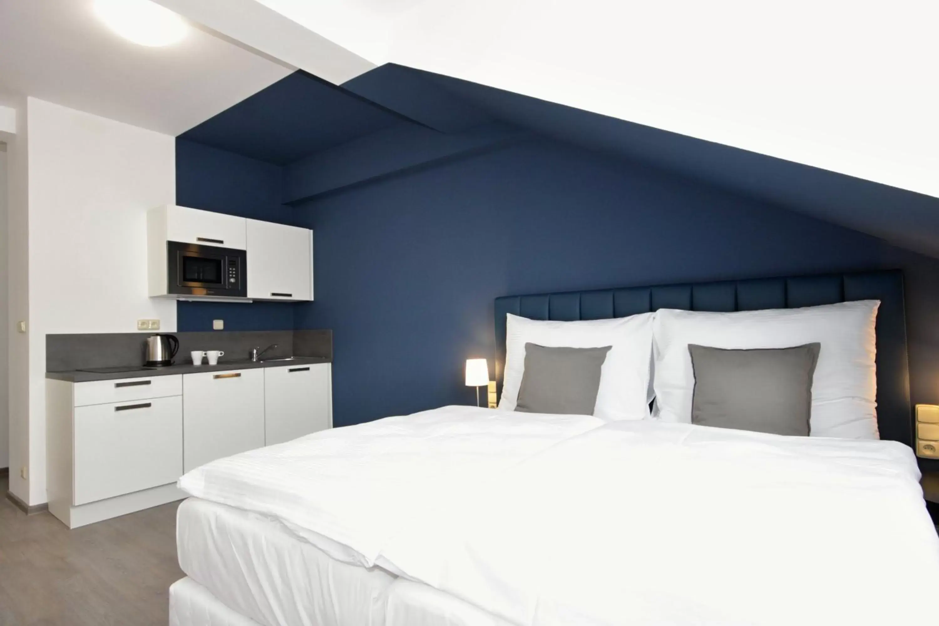 Kitchen or kitchenette, Bed in Alveo Suites Kitchen or kitchenette, Bed in Alveo Suites