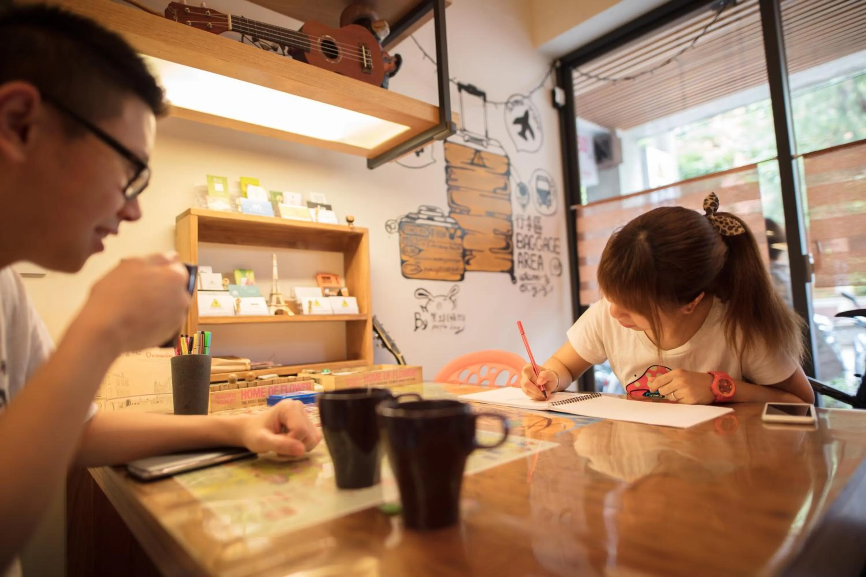 Communal lounge/ TV room in On My Way - Taipei Hostel