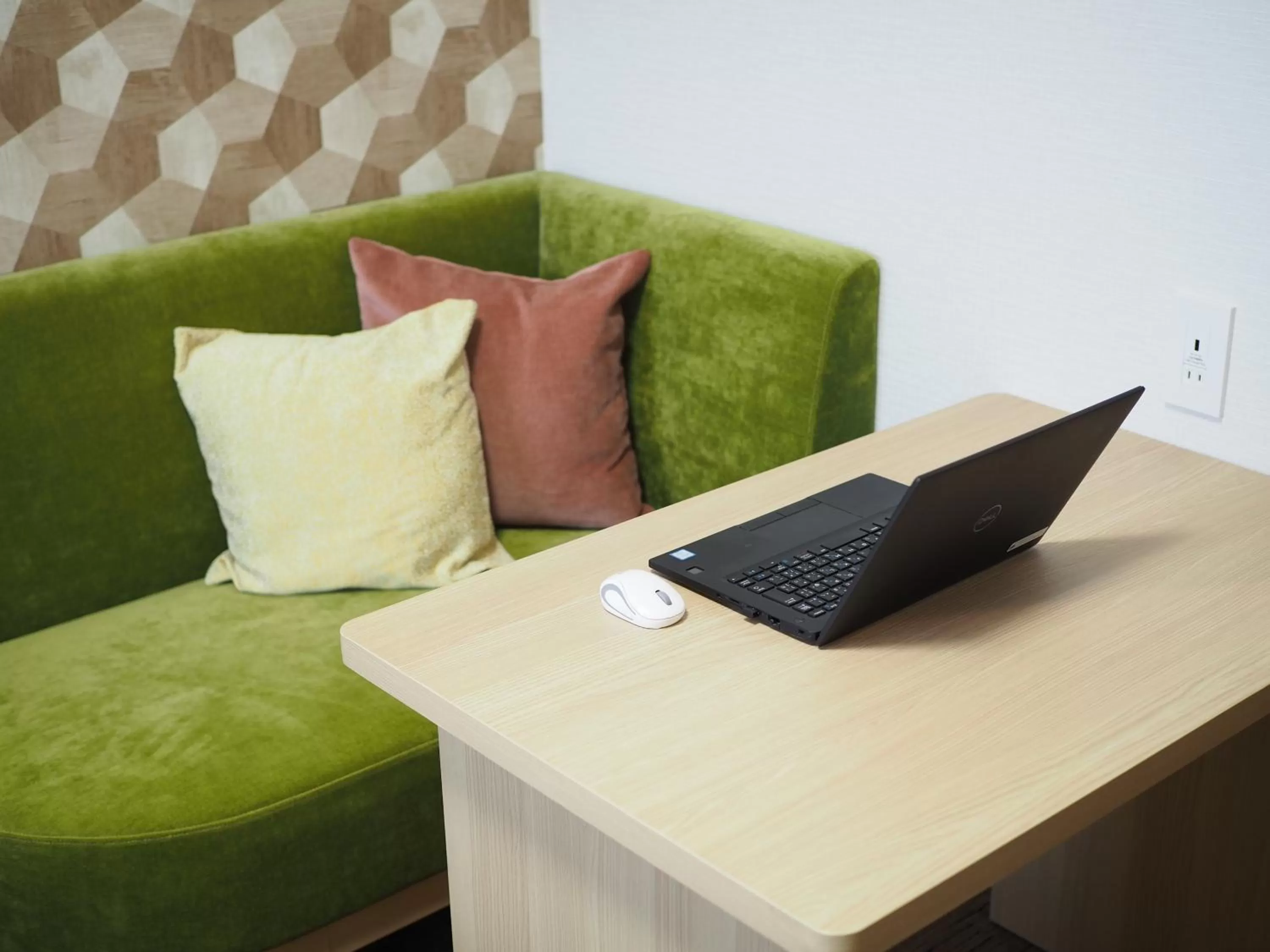 Seating area in Tabino Hotel lit Matsumoto Milky white Onsen