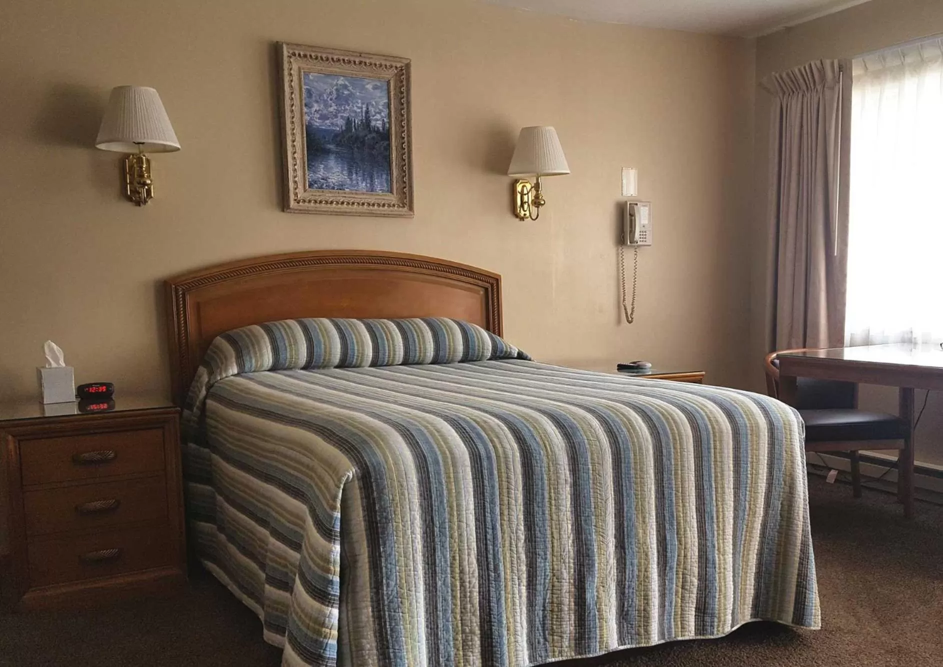 Bed in Bristlecone Motel