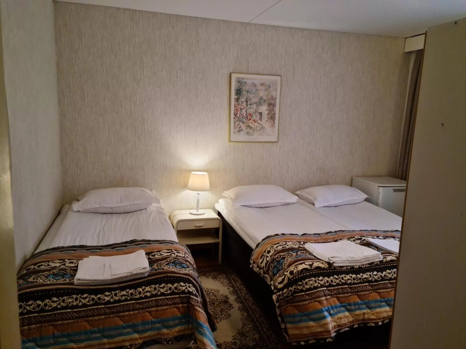 Bed in Hotelli Sandels