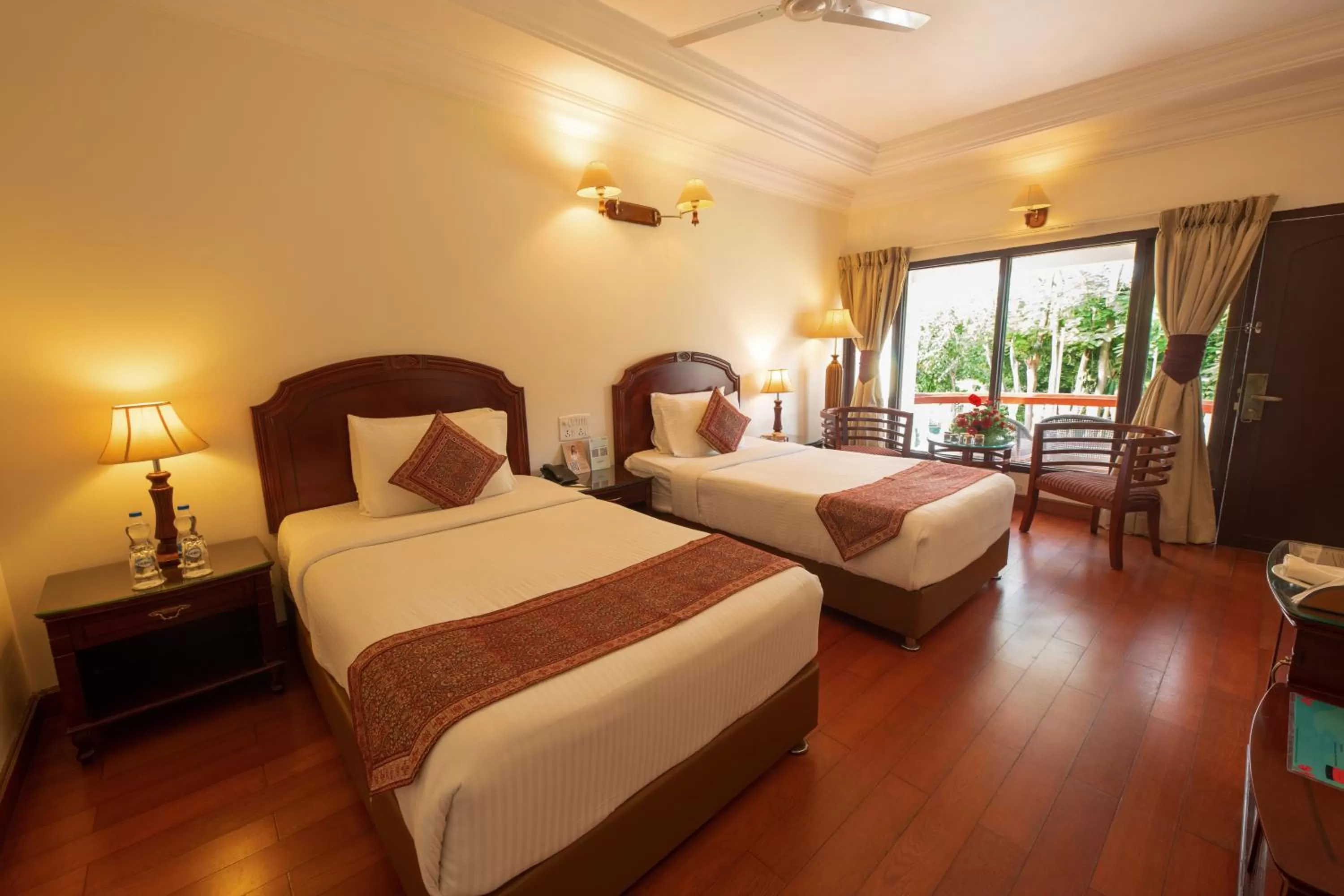 Living room, Bed in GReaT Trails Riverview Thanjavur By GRT Hotels