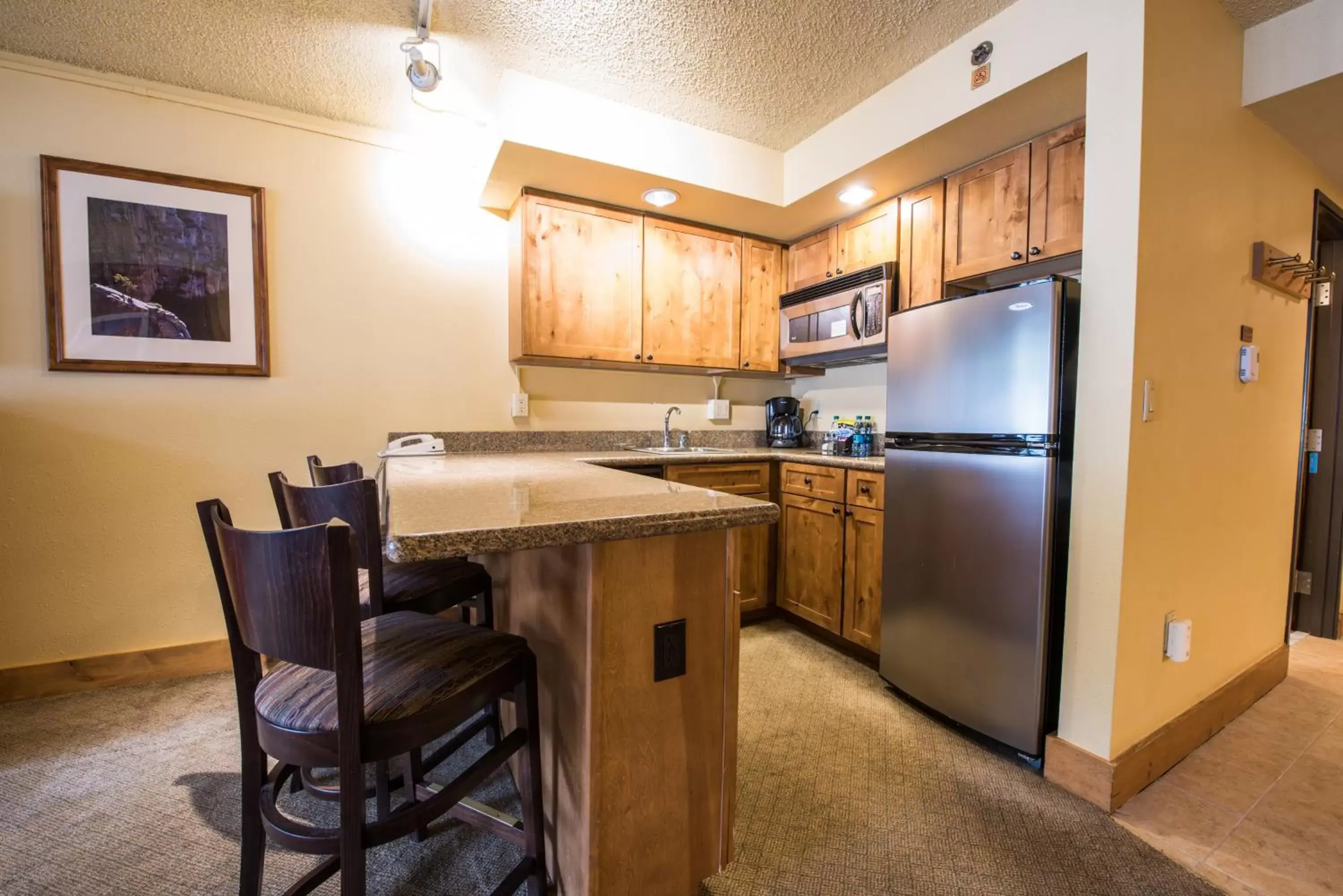 Kitchen/Kitchenette in The Grand Lodge Hotel and Suites