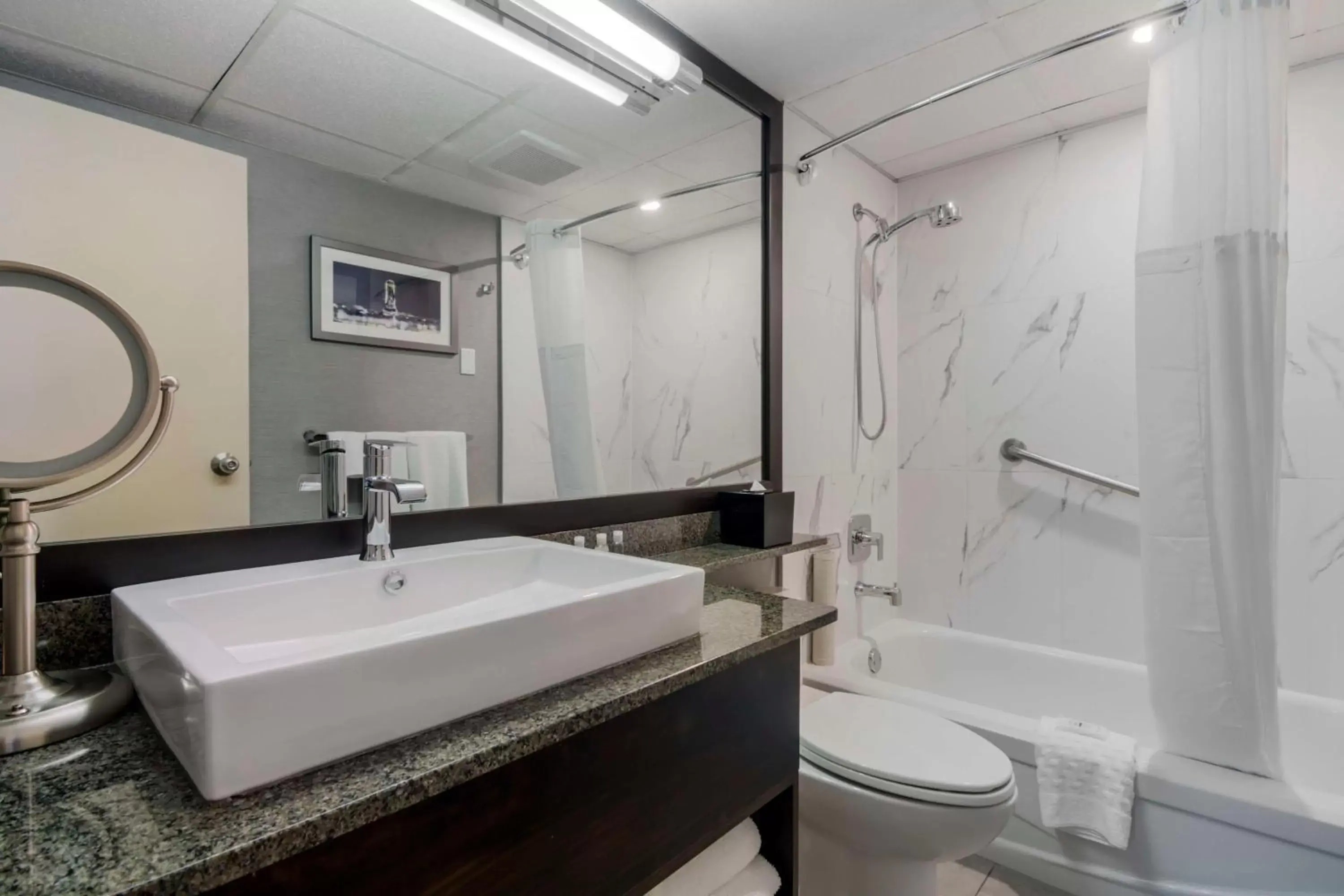 Bathroom in Best Western Premier Chateau Granville Hotel & Suites & Conference Centre