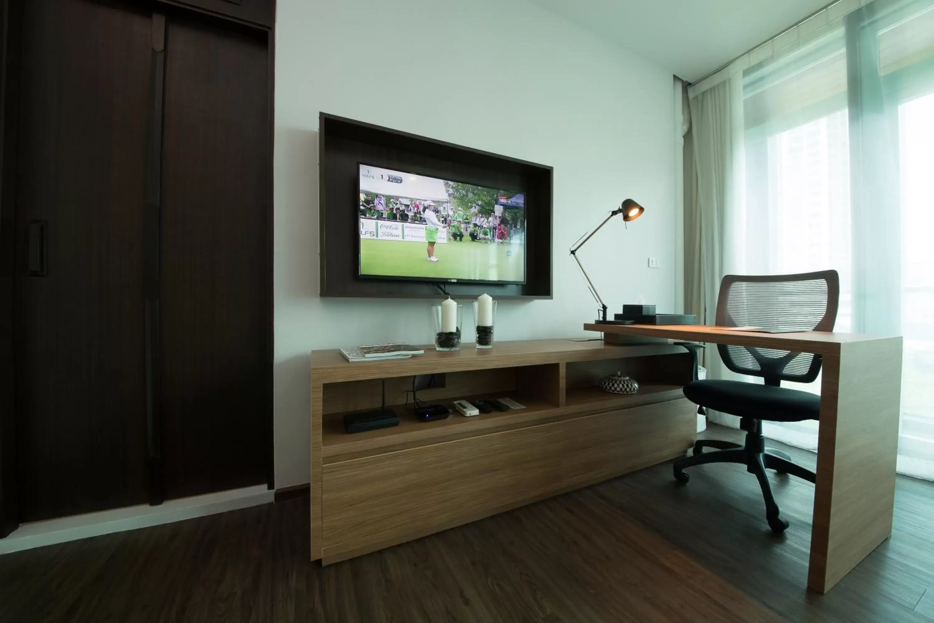 TV and multimedia, TV/Entertainment Center in Civic Horizon Hotel & Residence
