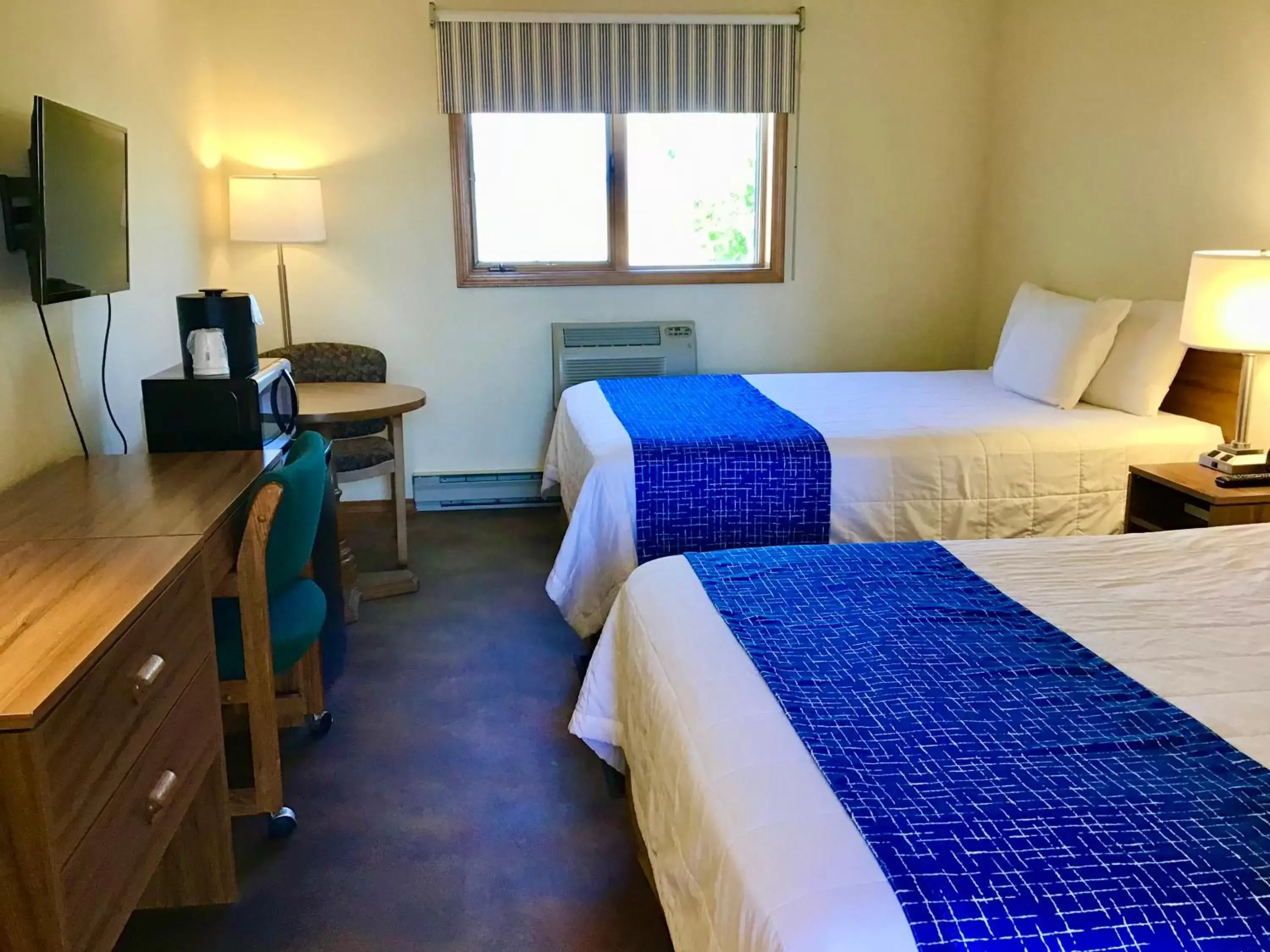 Bedroom, Bed in Travelodge by Wyndham Three Forks Bedroom, Bed in Travelodge by Wyndham Three Forks