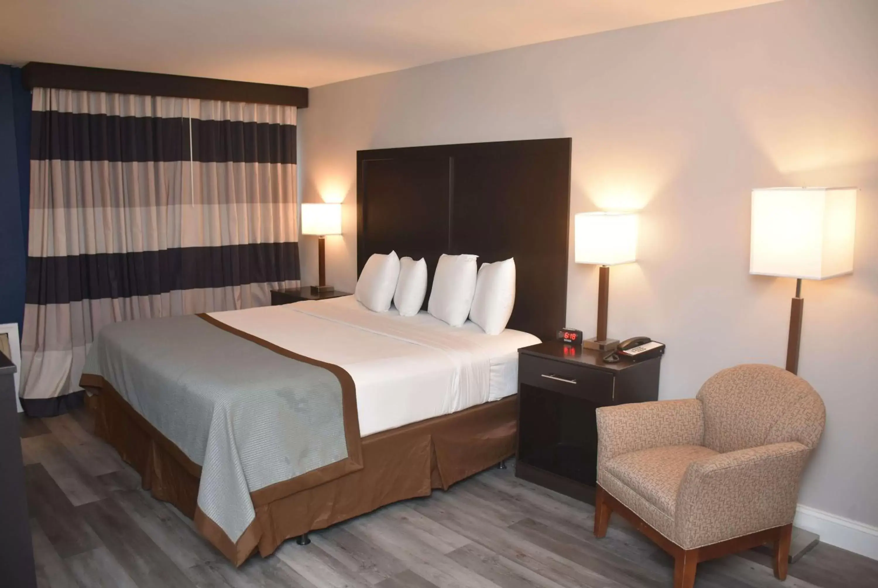 Photo of the whole room, Bed in Ramada by Wyndham Vineland Millville Area