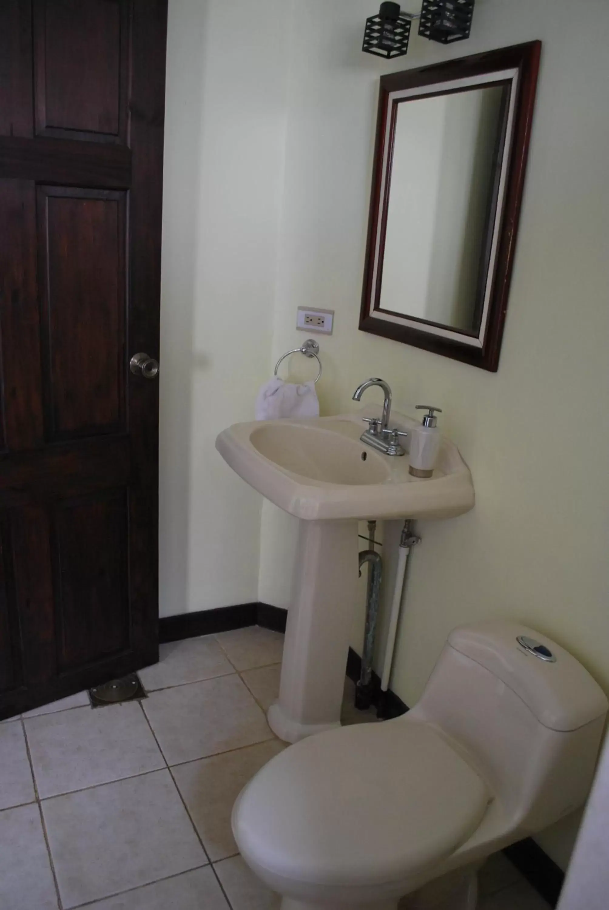 Bathroom in Dos Palmas Studio Apartments