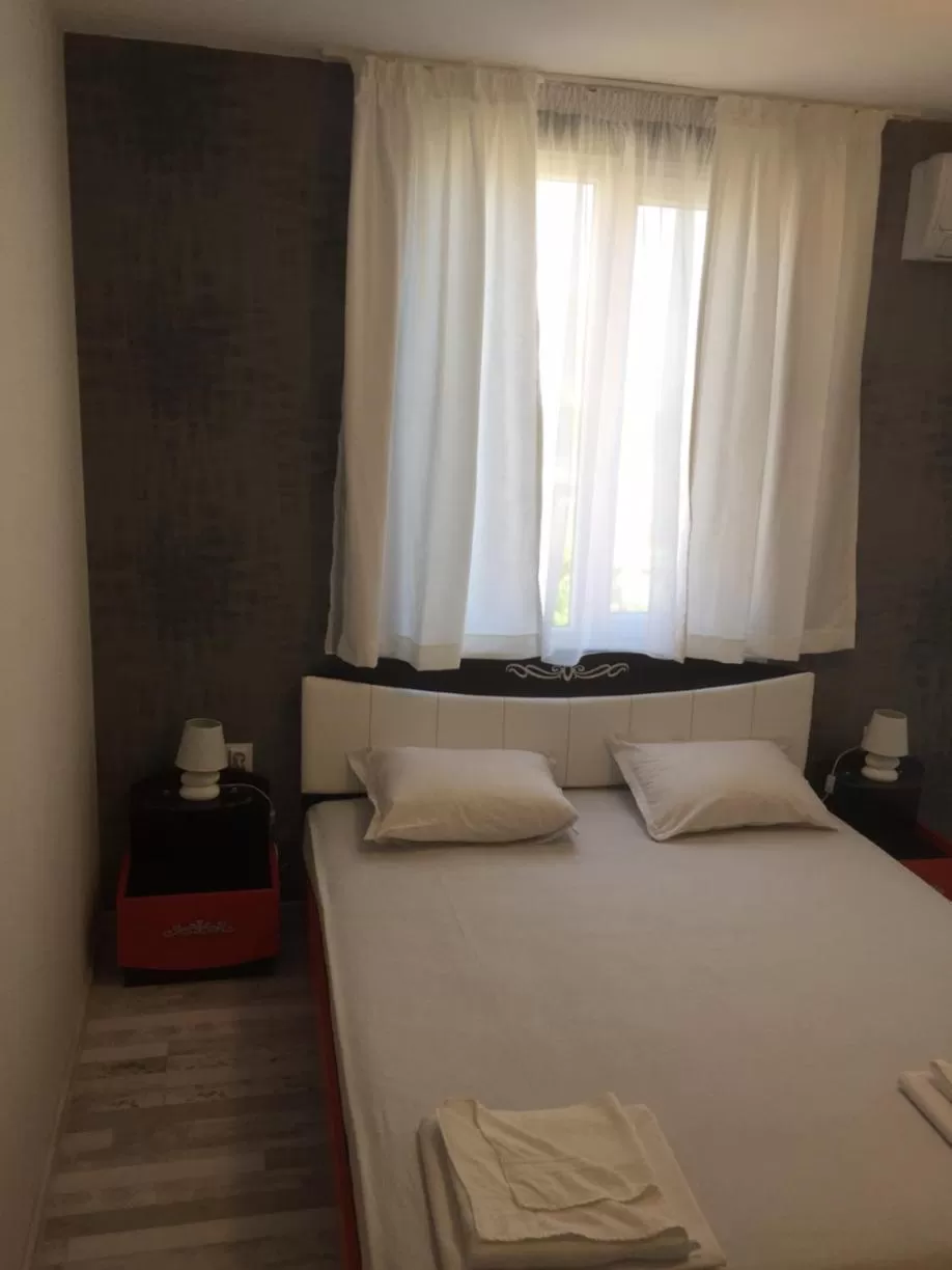 Bed in Family Hotel Malibu