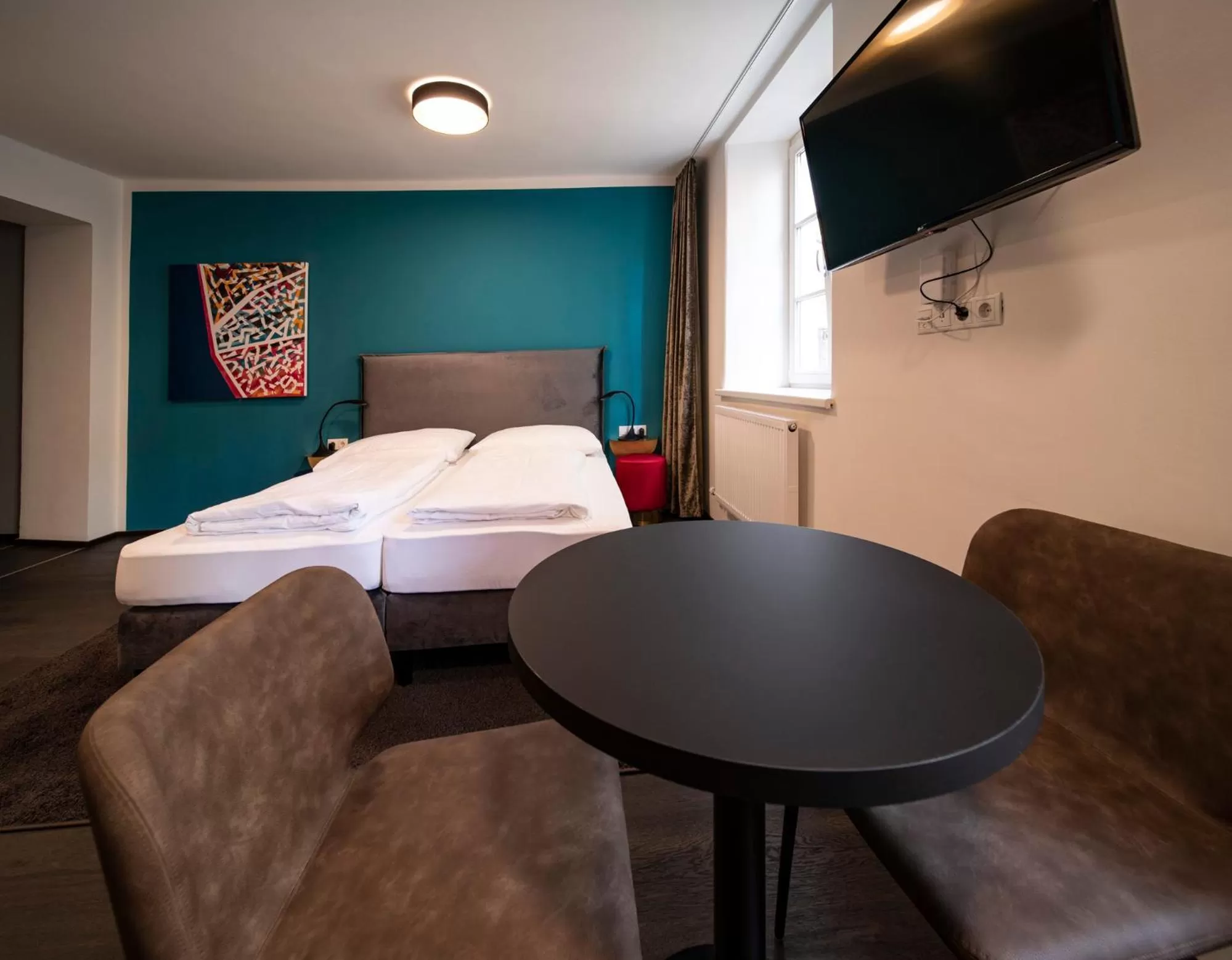 Bed in Blackhome Innsbruck Boutique I contactless check-in