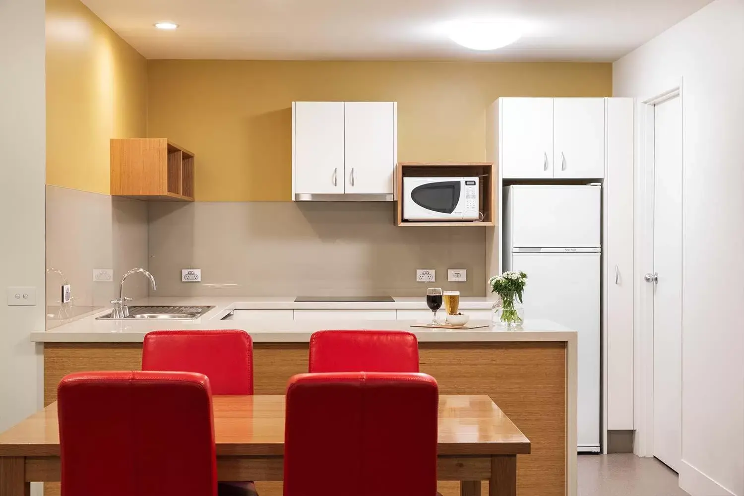 Kitchen/Kitchenette in The Old Woolstore Apartment Hotel