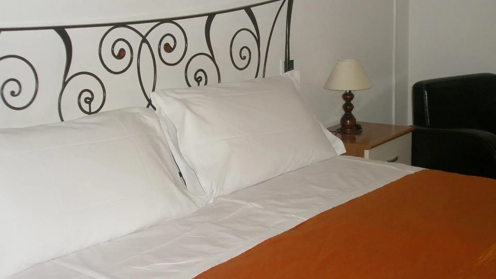 Bed in Hotel Athena