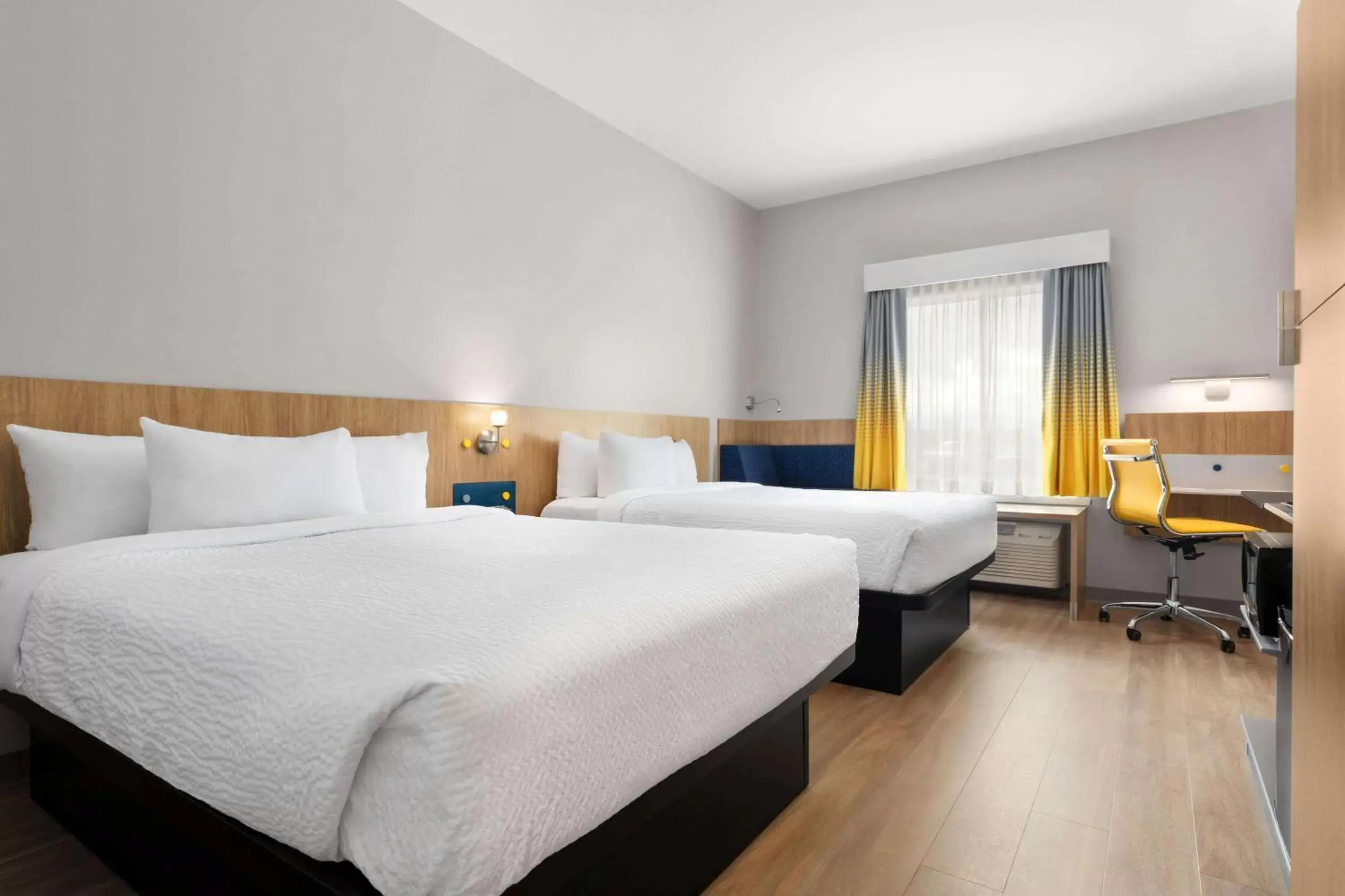 Photo of the whole room, Bed in Microtel Inn Suites by Wyndham Lac-Megantic Photo of the whole room, Bed in Microtel Inn Suites by Wyndham Lac-Megantic