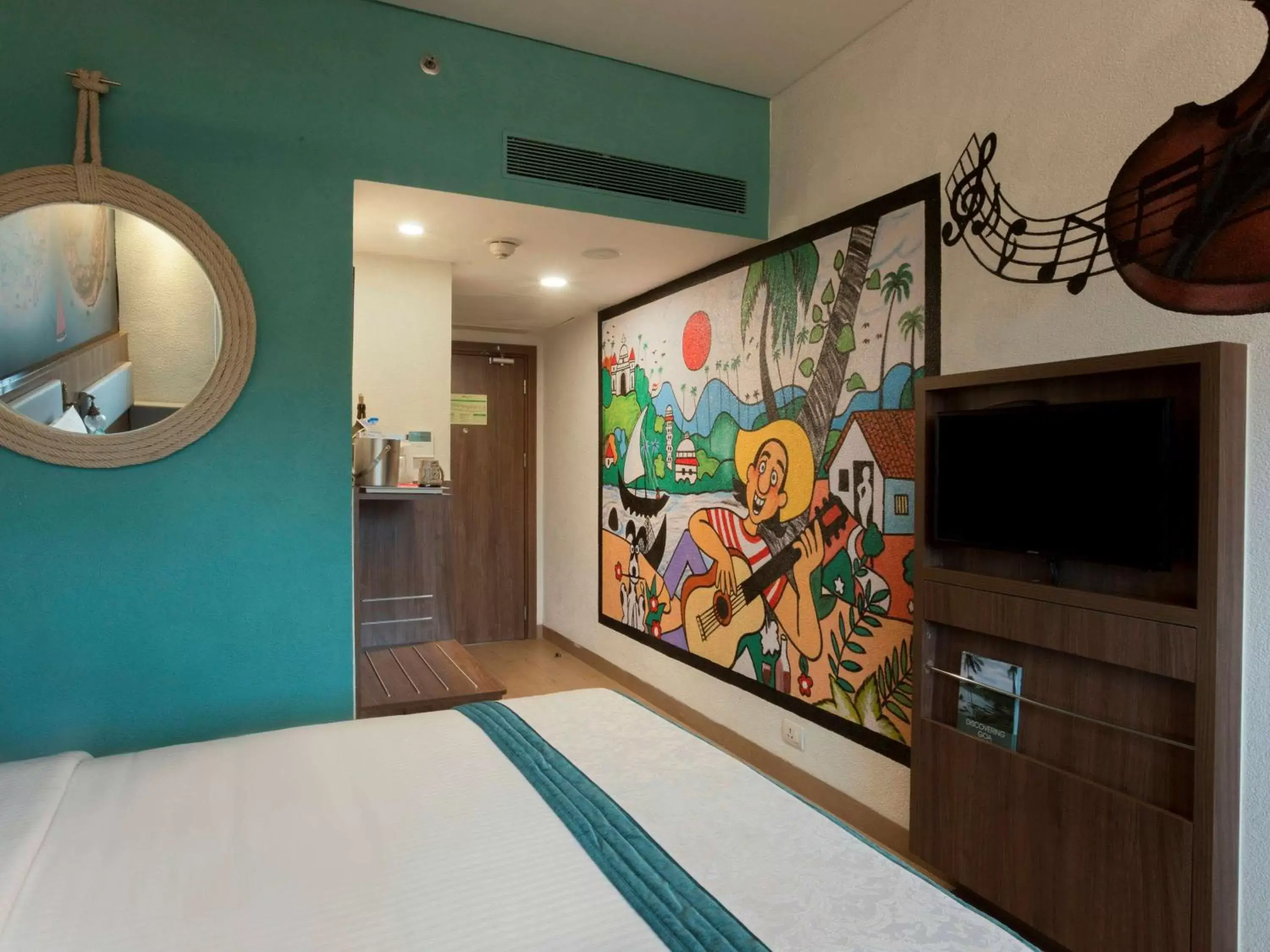 Photo of the whole room, TV/Entertainment Center in ibis Styles Goa Calangute - An Accor Brand