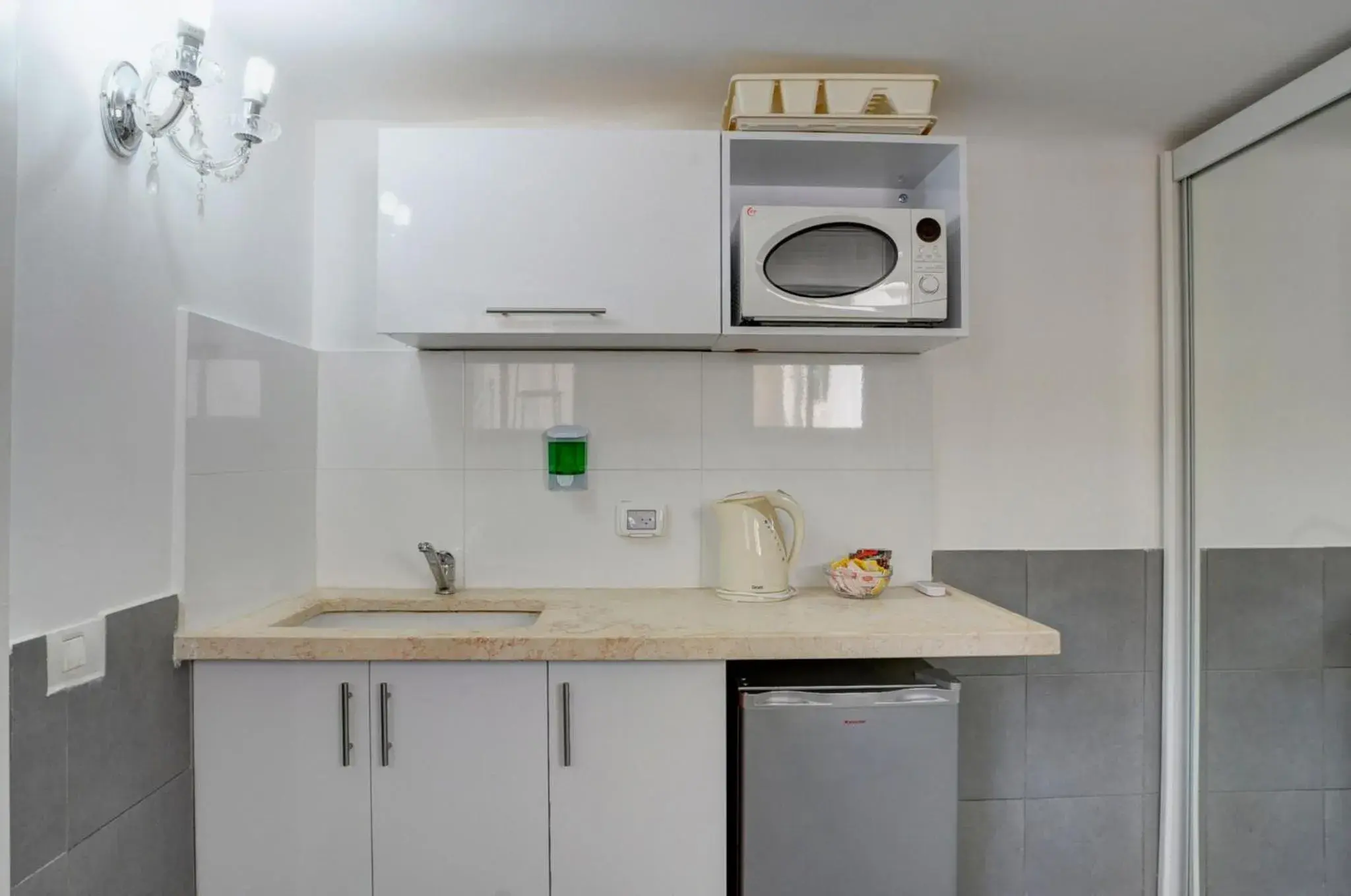 Kitchen or kitchenette, Kitchen/Kitchenette in Liber Tel Aviv Sea Shore Suites