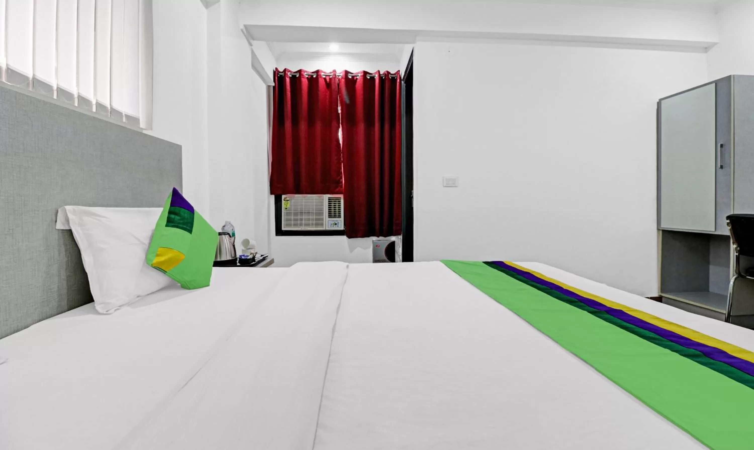 Bedroom, Bed in Treebo Grand Town House