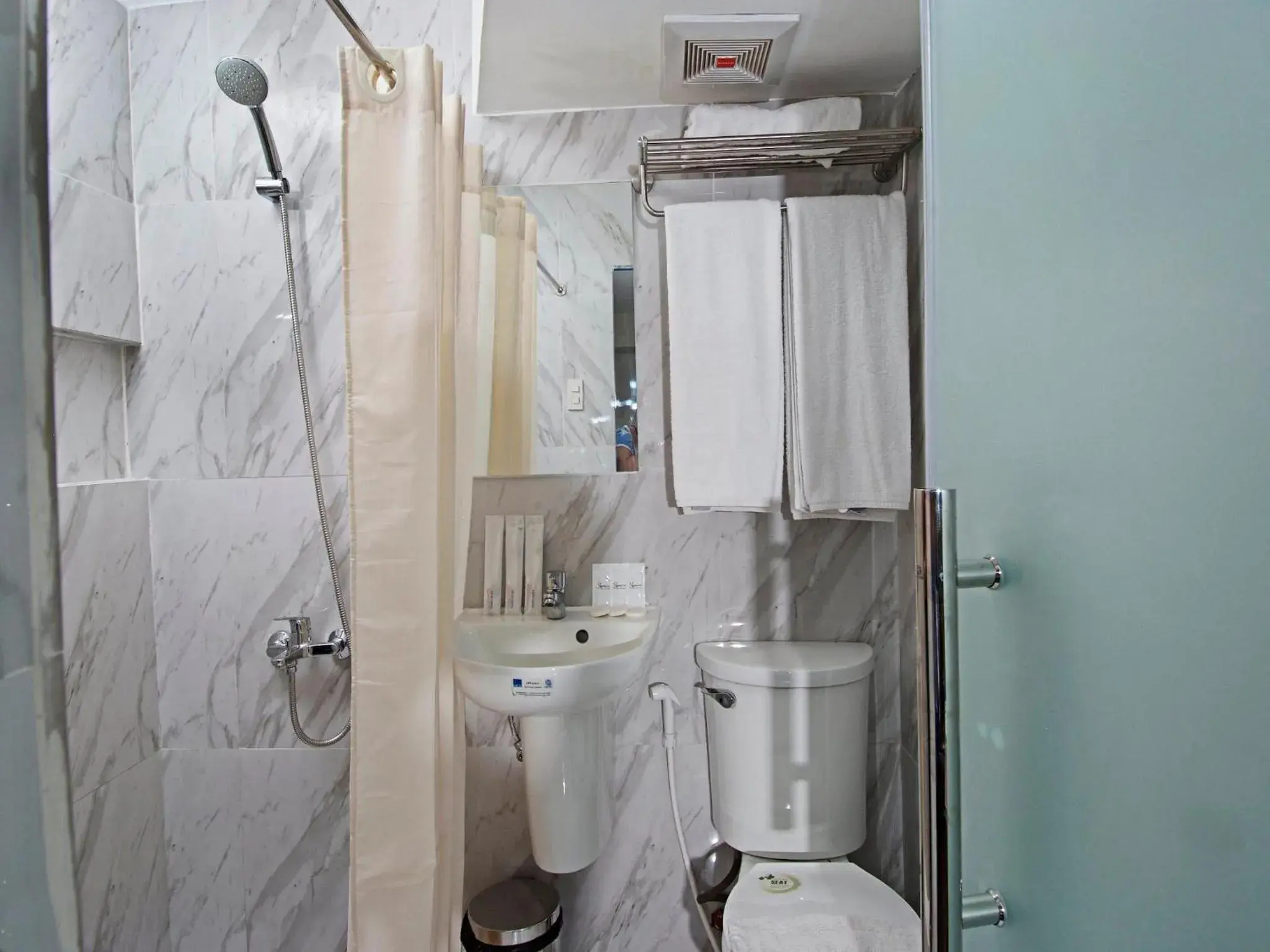 Shower, Bathroom in Skyblue Hotel