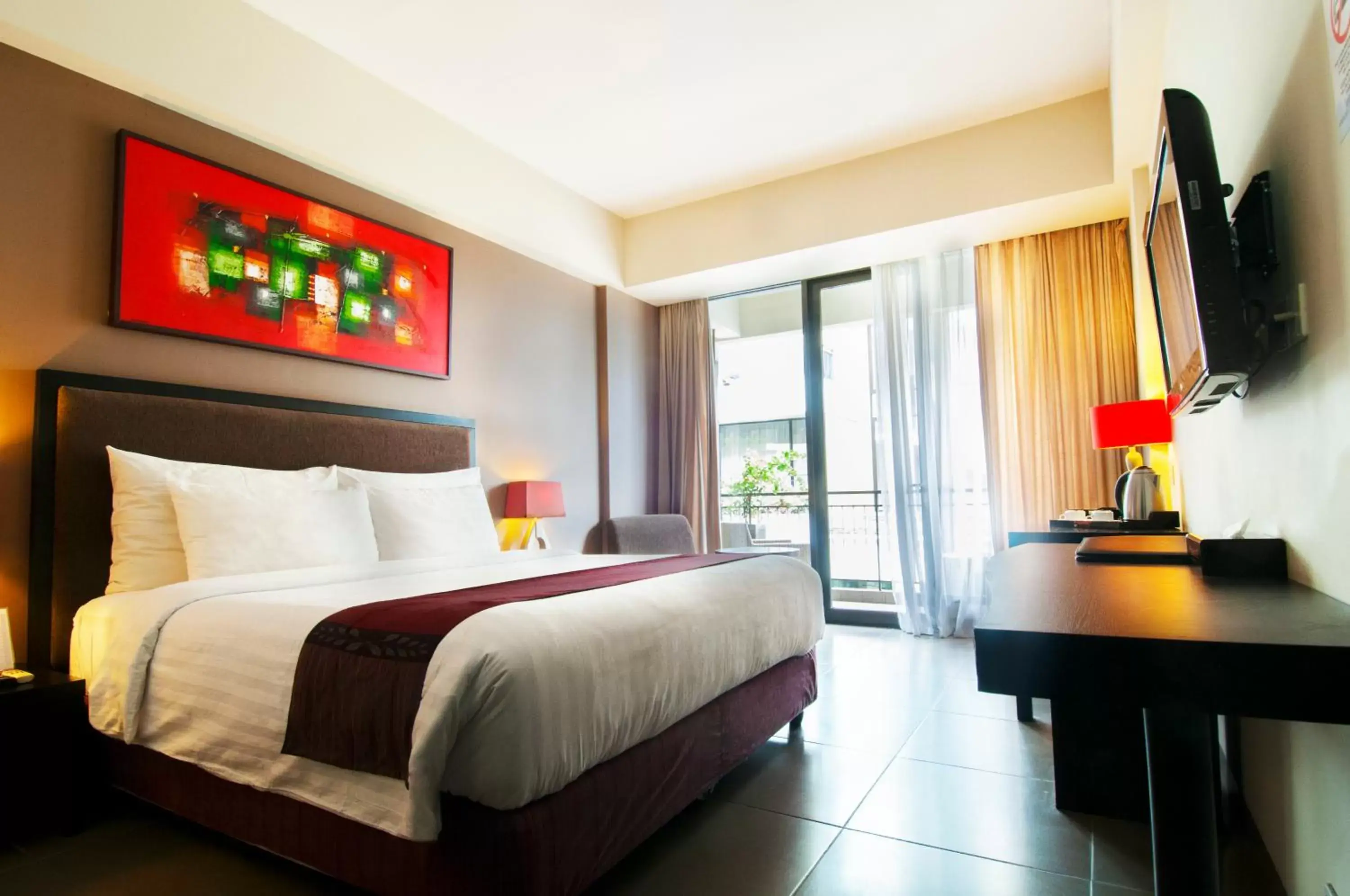 Bedroom in 100 Sunset Kuta Hotel & Ballroom