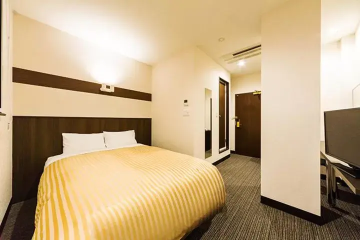 Bed in Hotel CASVI Tenjin