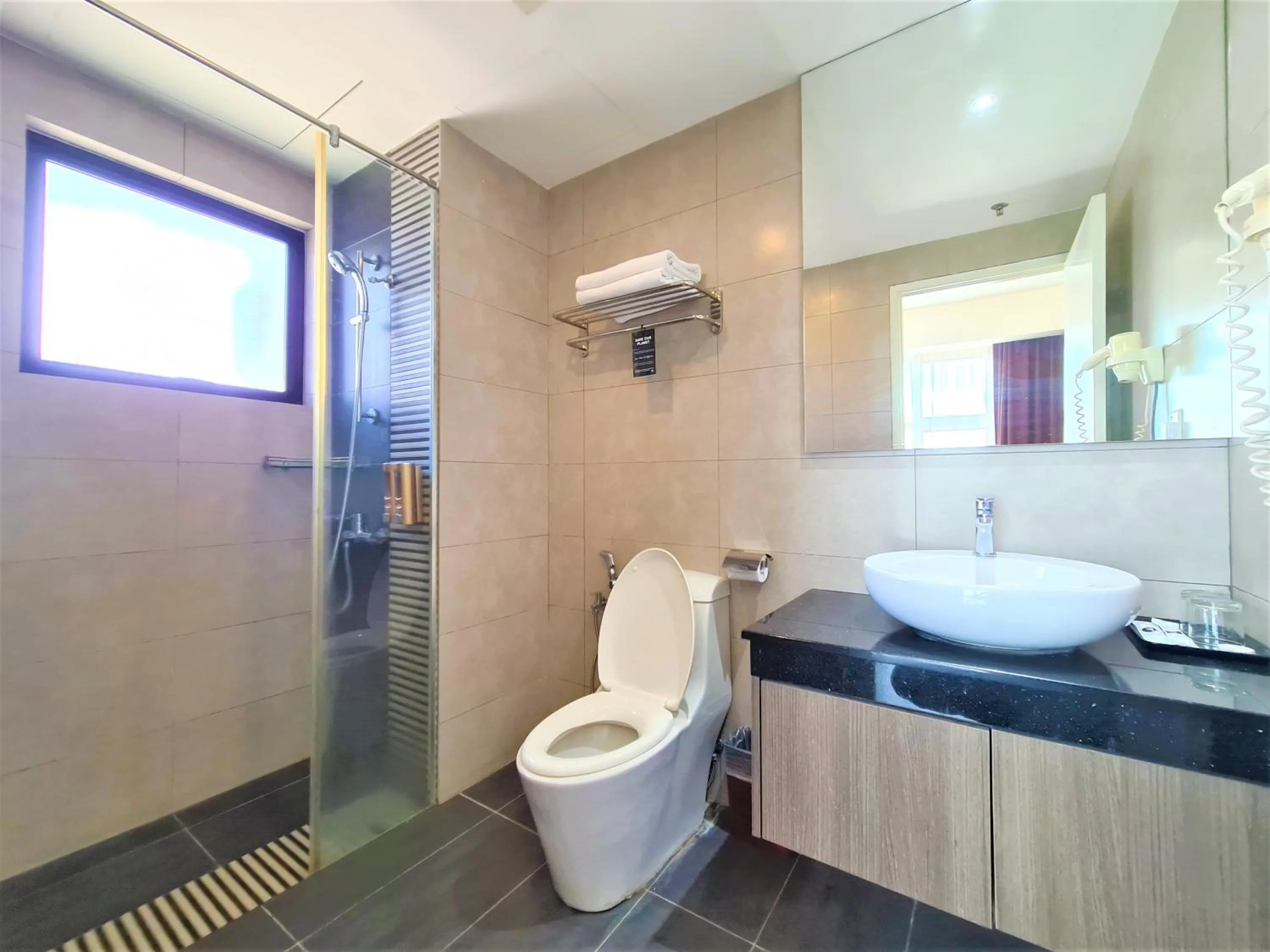 Toilet in Nexus Regency Suites & Hotel